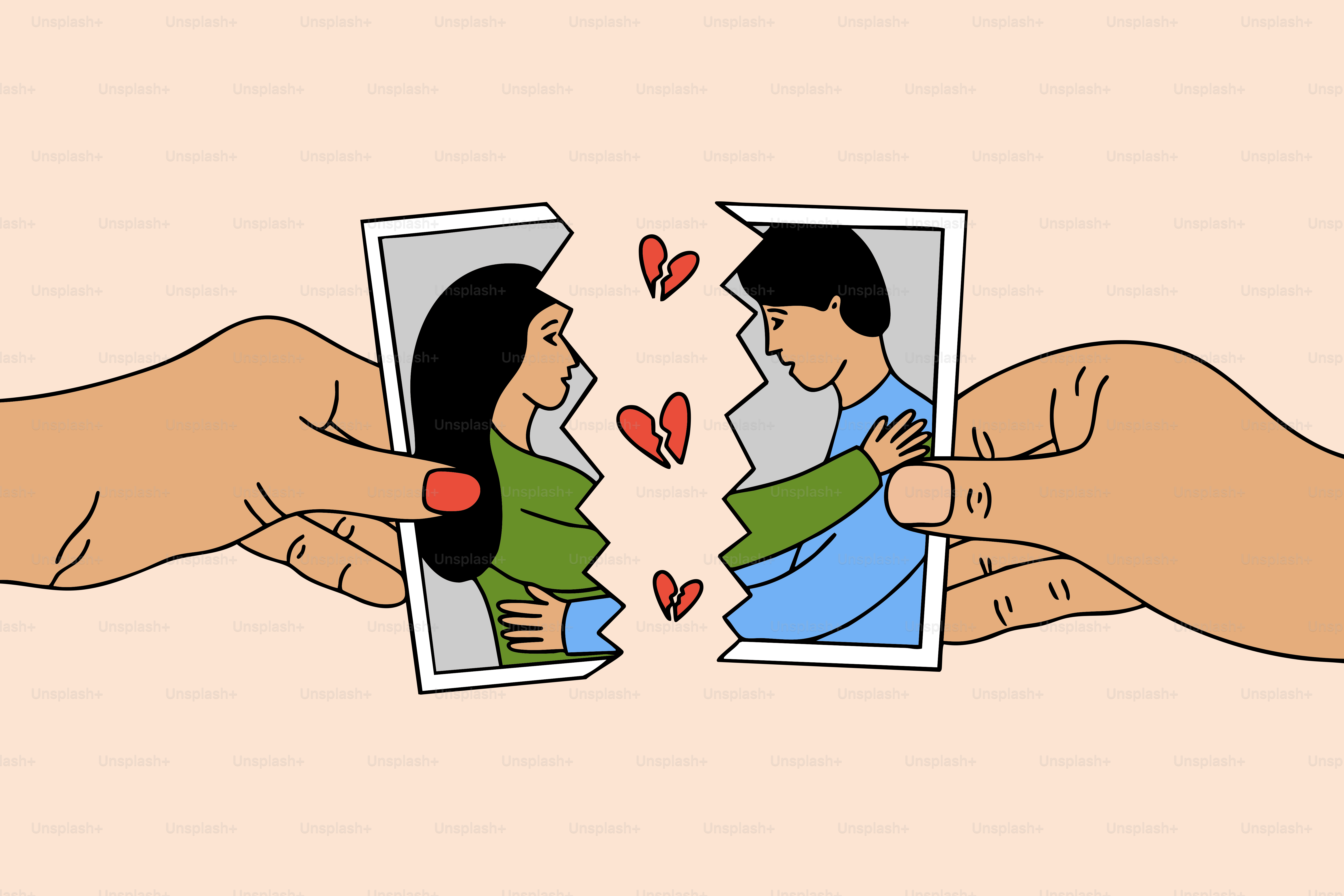 Couple's torn photograph with broken hearts