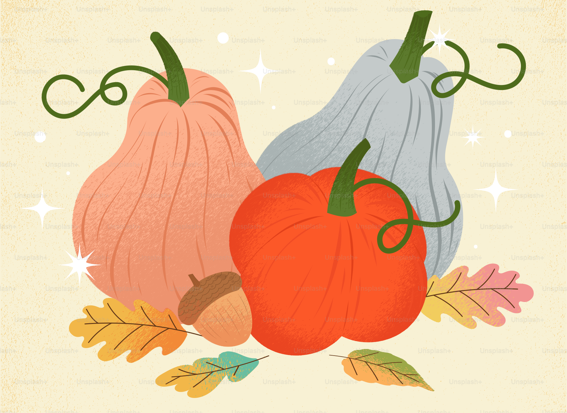 Drei Kürbisse und Herbstblätter mit Glitzer