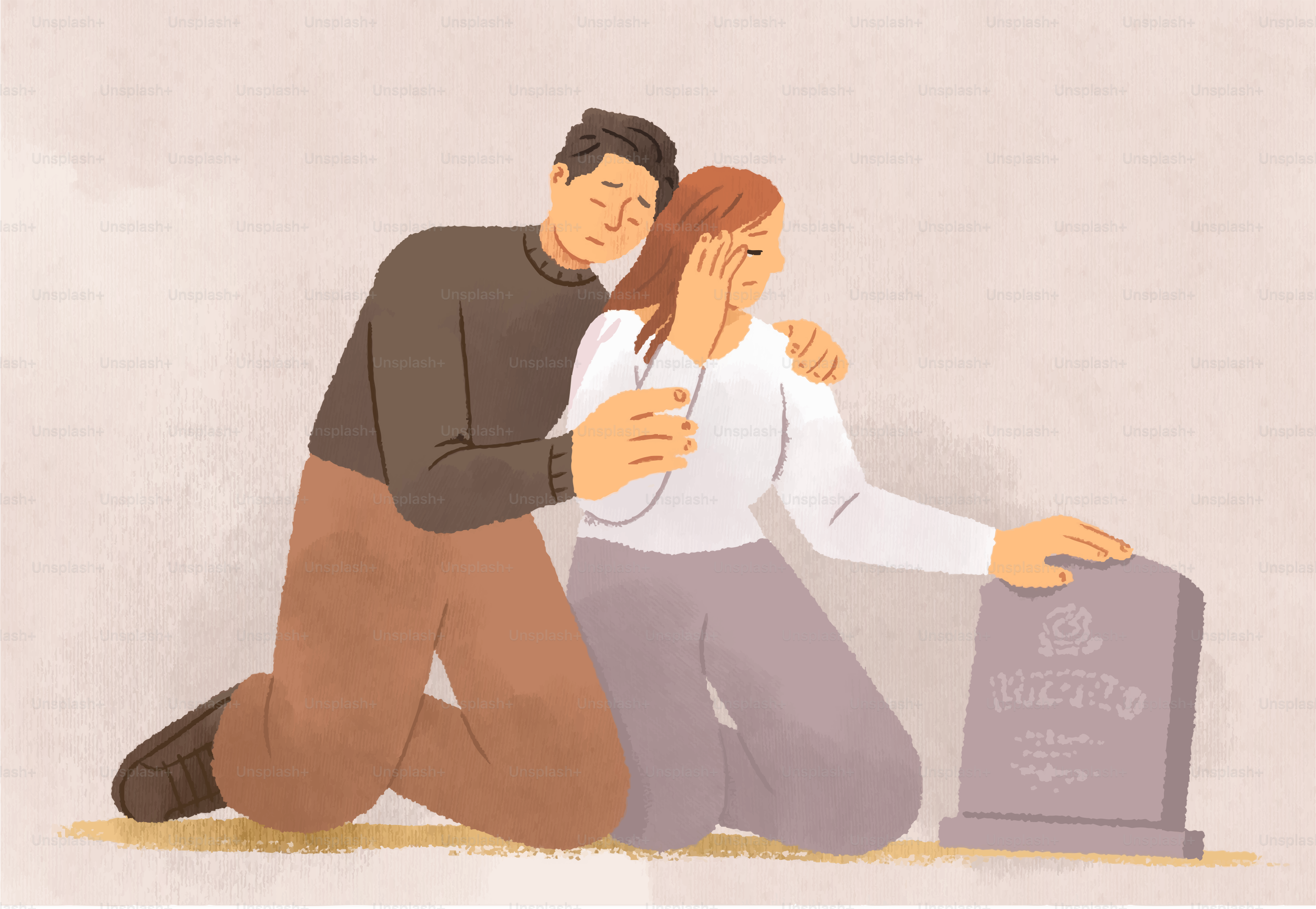 Grieving couple at a gravestone