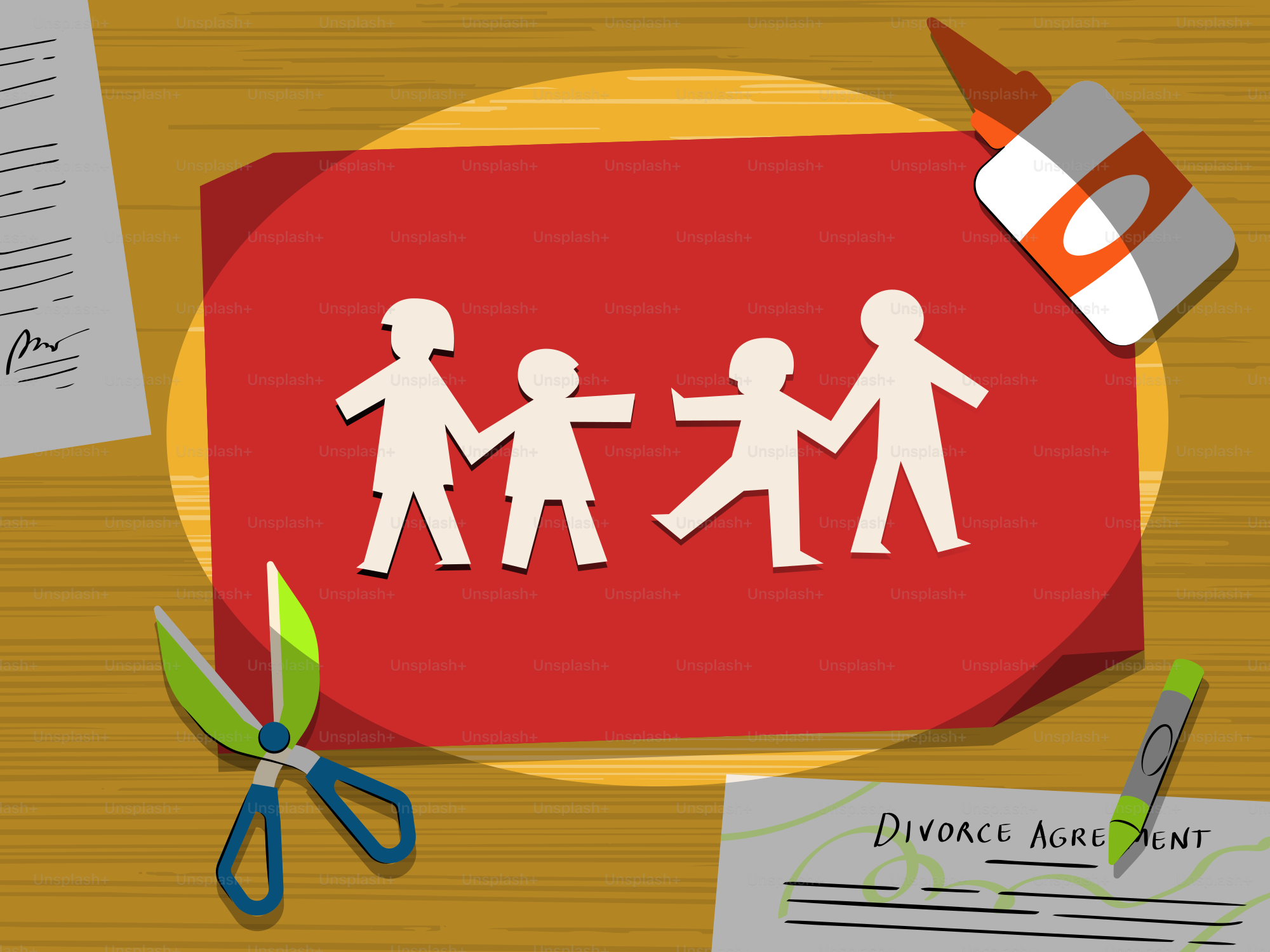 Paper family cutouts on red paper with divorce agreement.