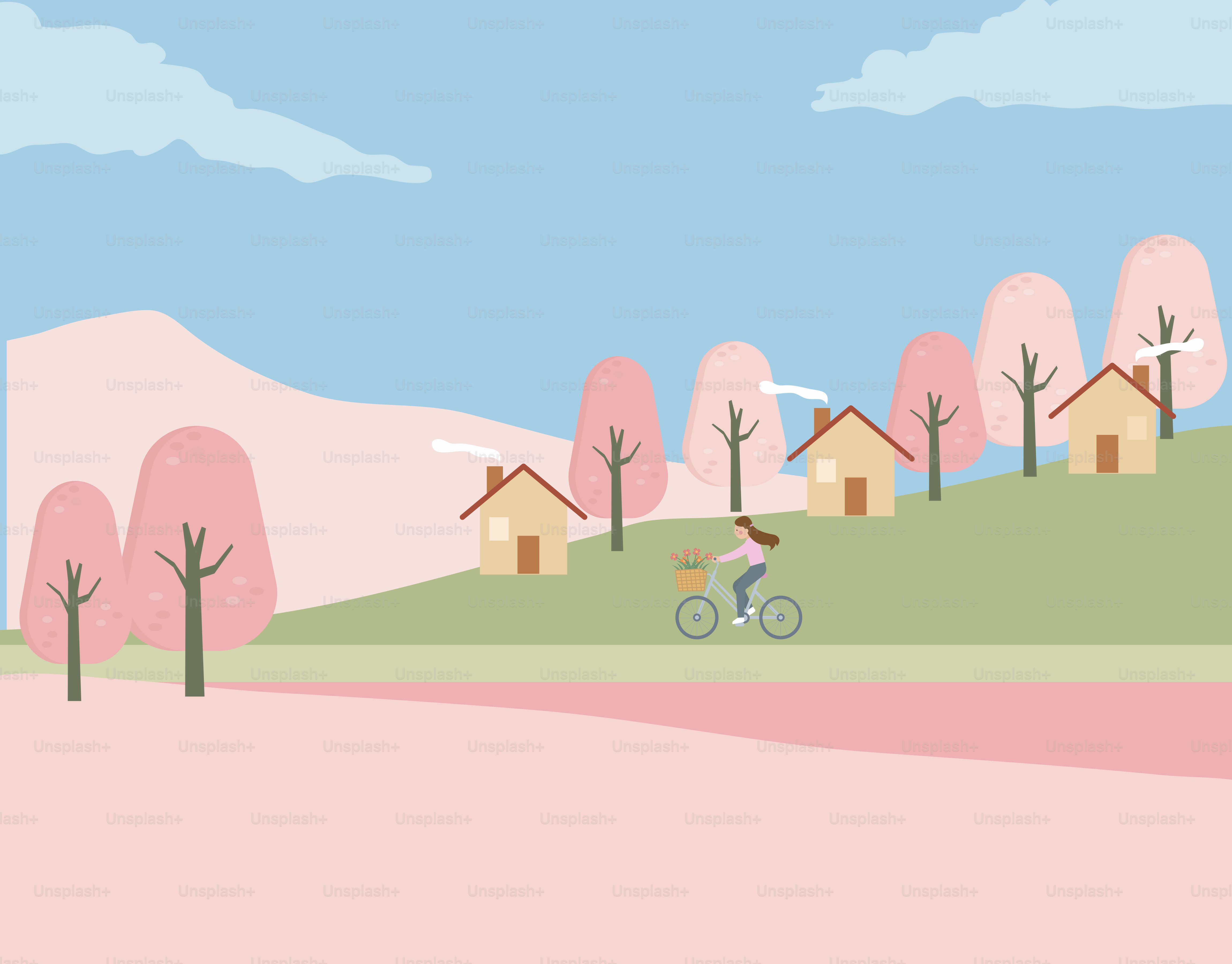 Woman cycling past houses in a scenic landscape.