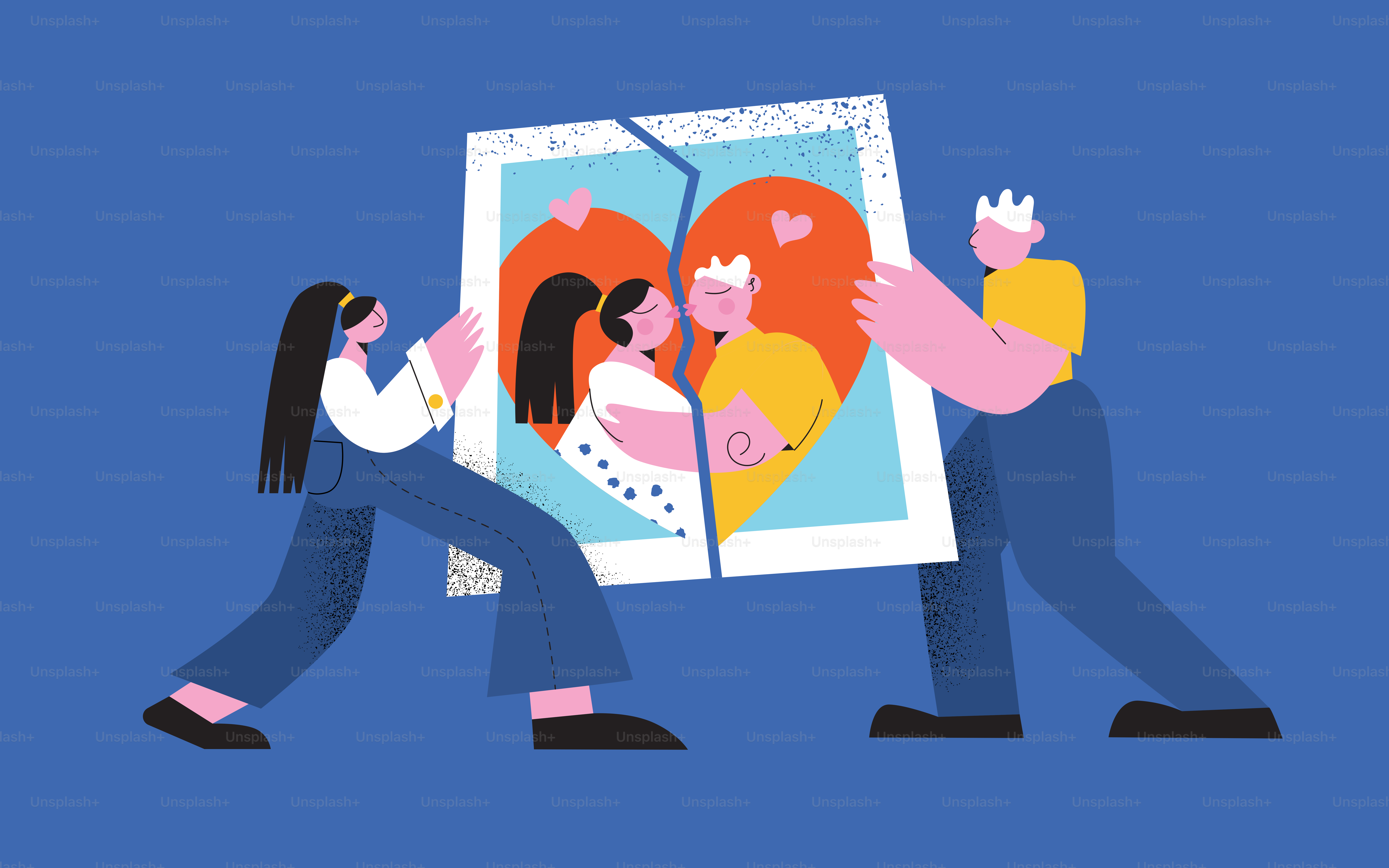 Couple tearing apart a broken heart photograph