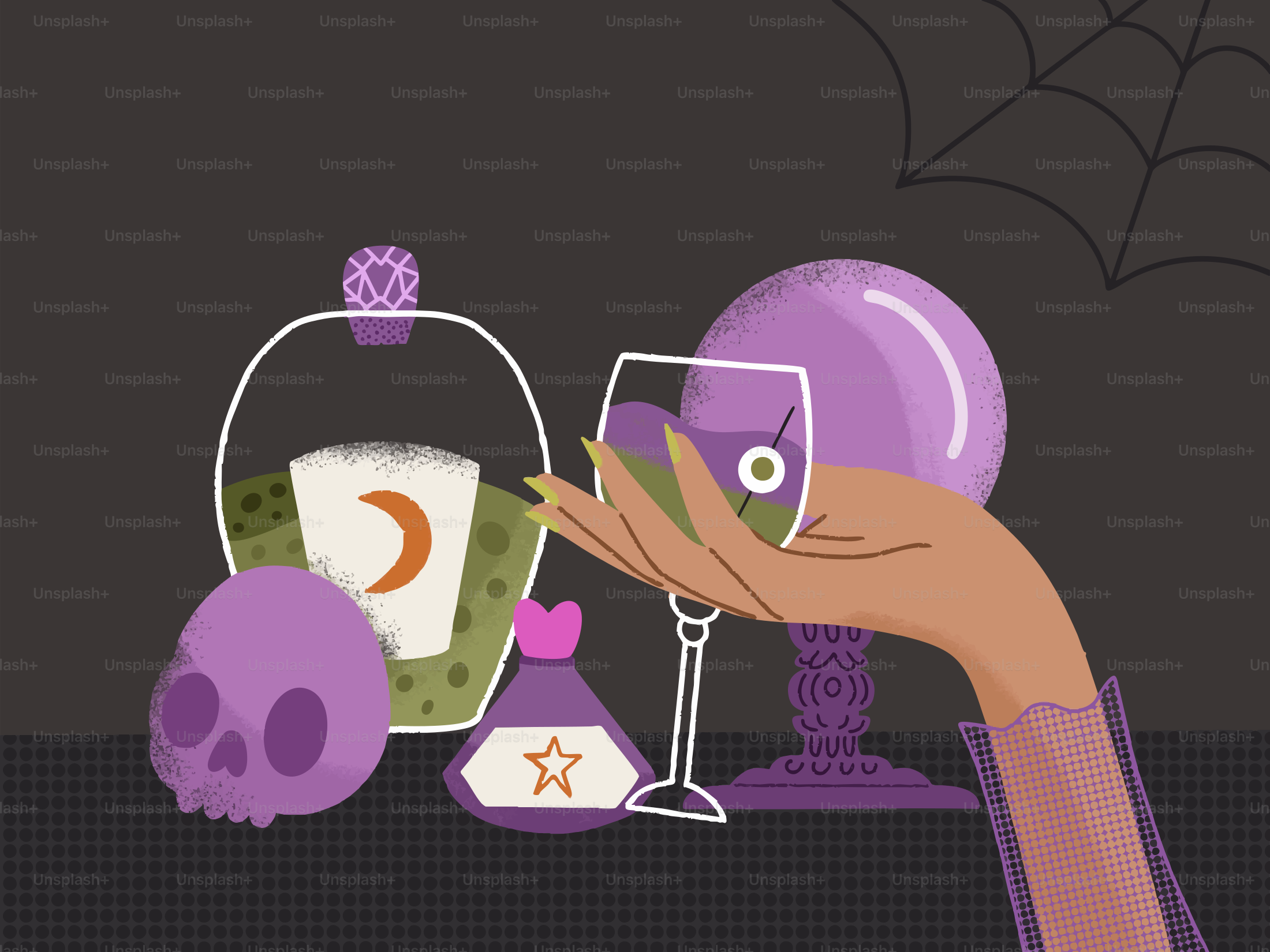 Oggetti di Halloween con una mano che tiene un bicchiere