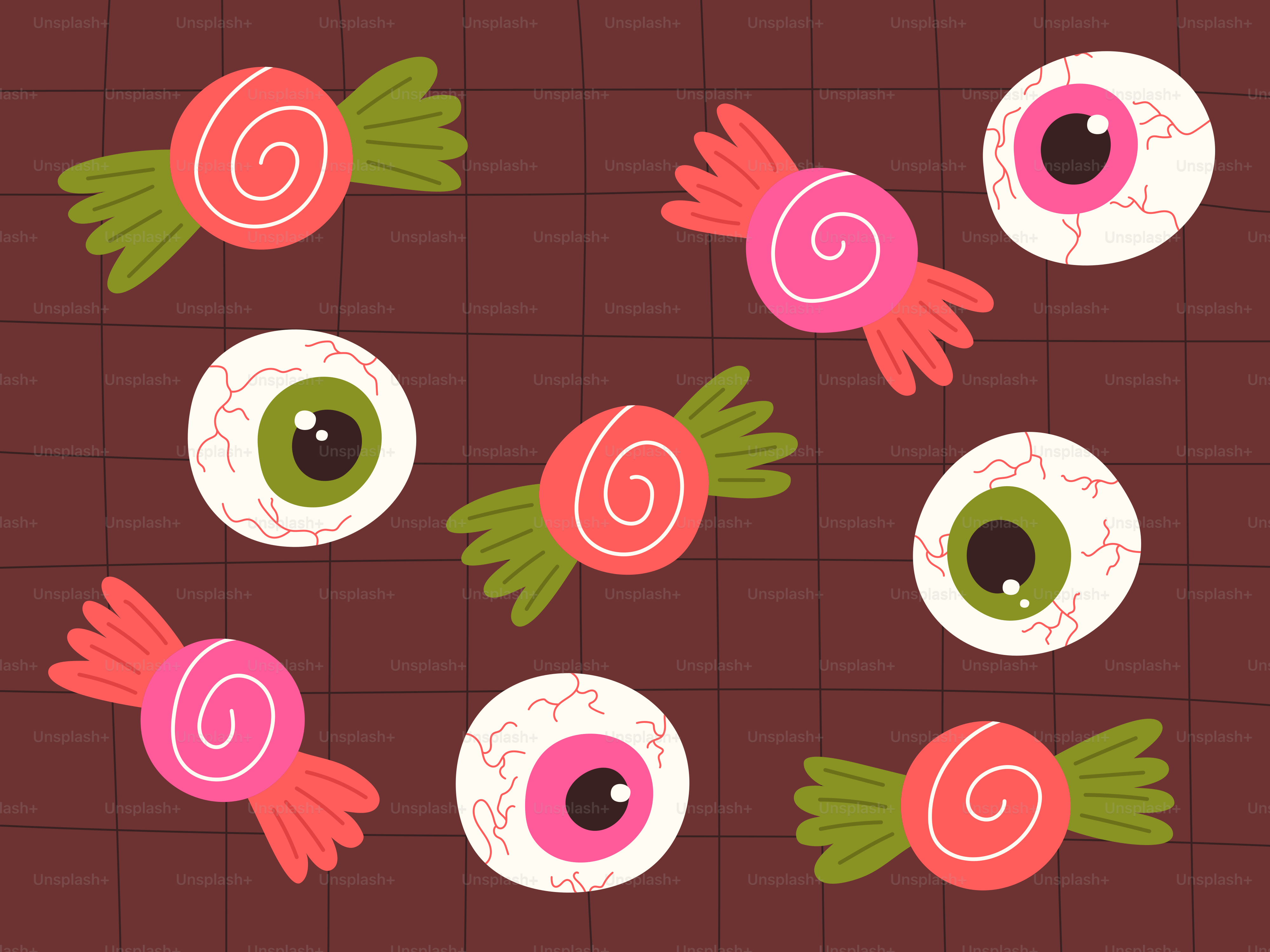 Halloween candies and eyeballs scattered on brown background