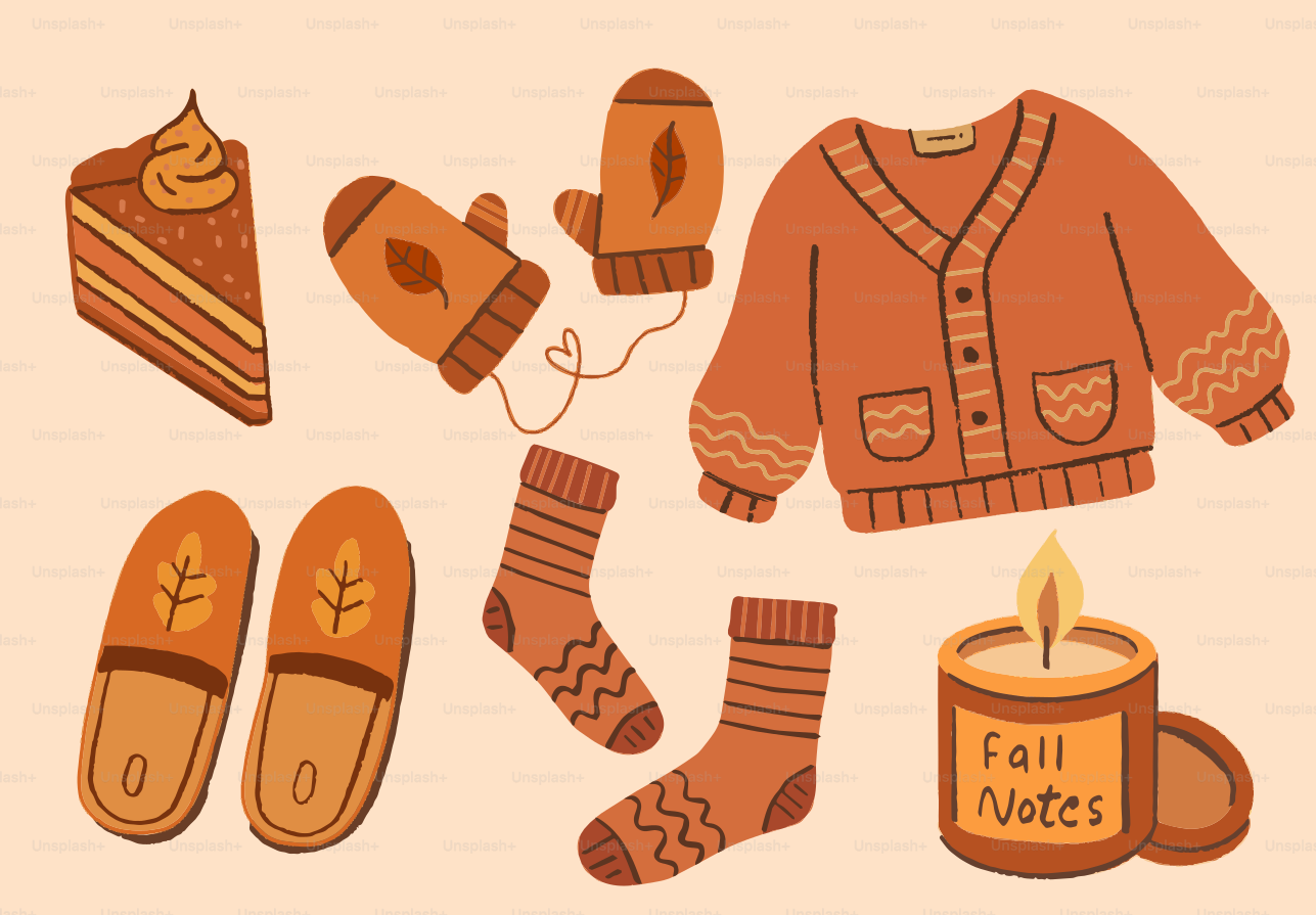 Cozy fall items including sweater, socks, mittens, and candle