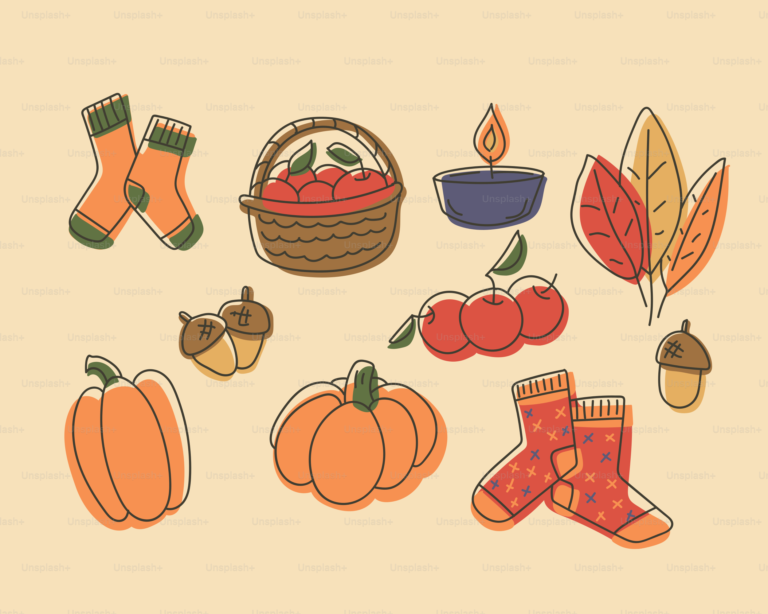 Herbstliche Elemente wie Kürbisse, Socken, Äpfel und Eicheln.