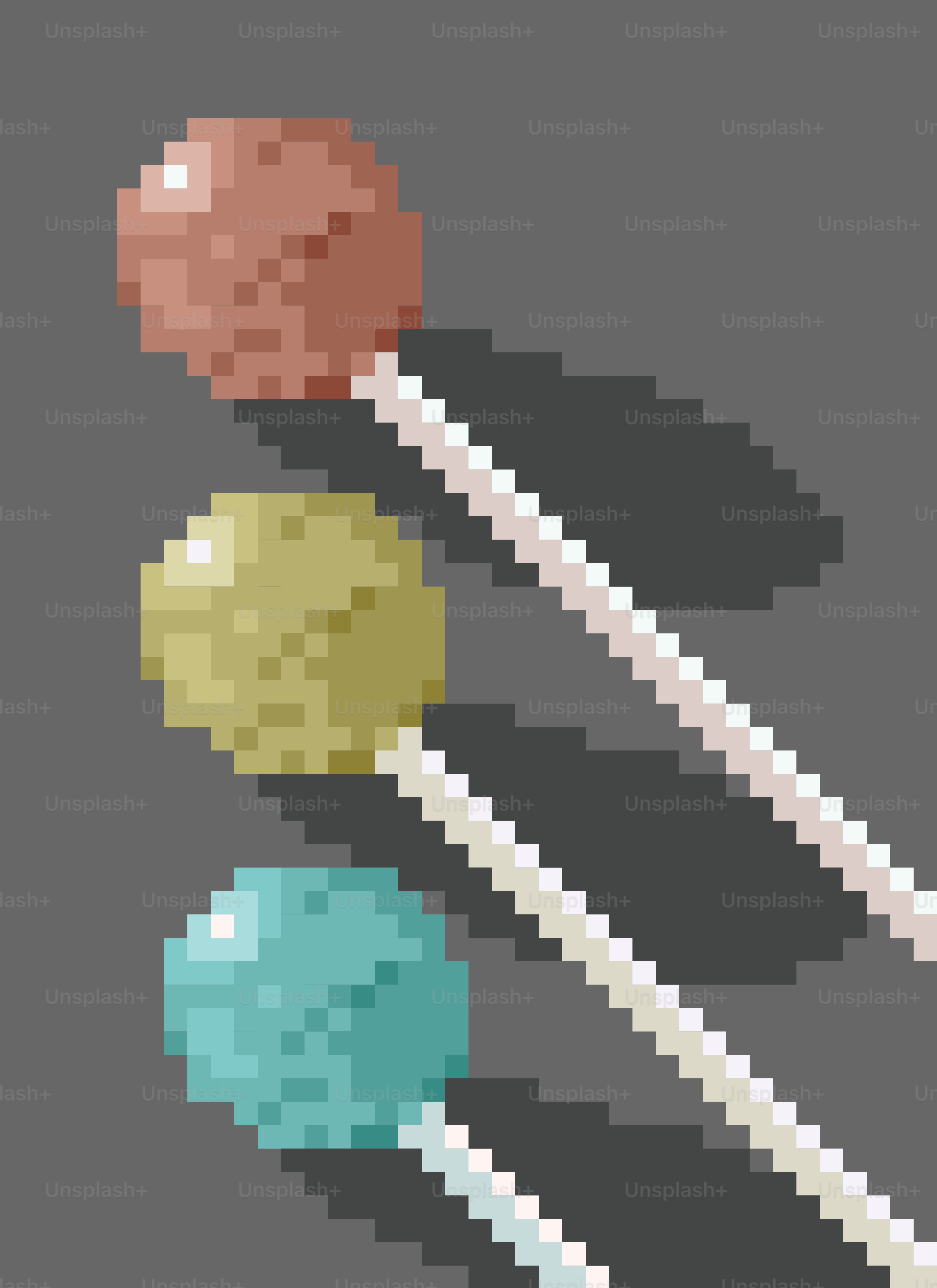 Three pixel art lollipops on gray background