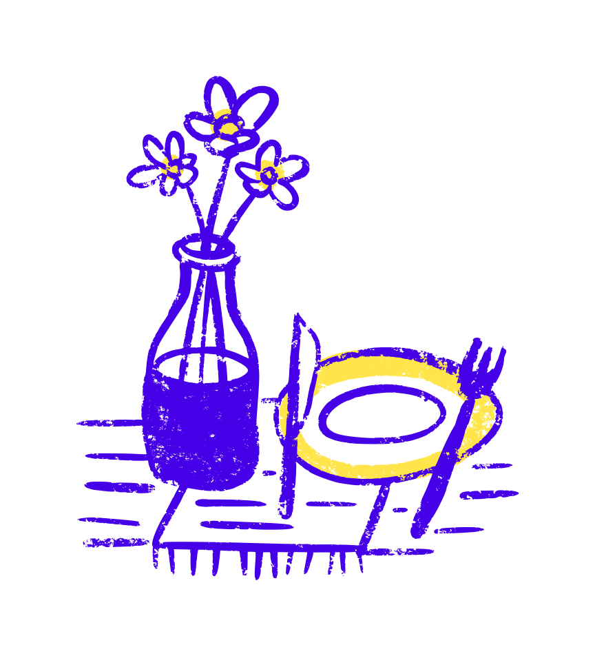 Vase of flowers with place setting on table