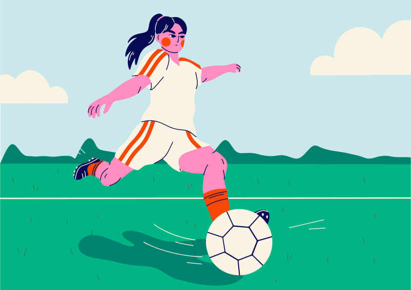 Woman kicking a soccer ball on a field.