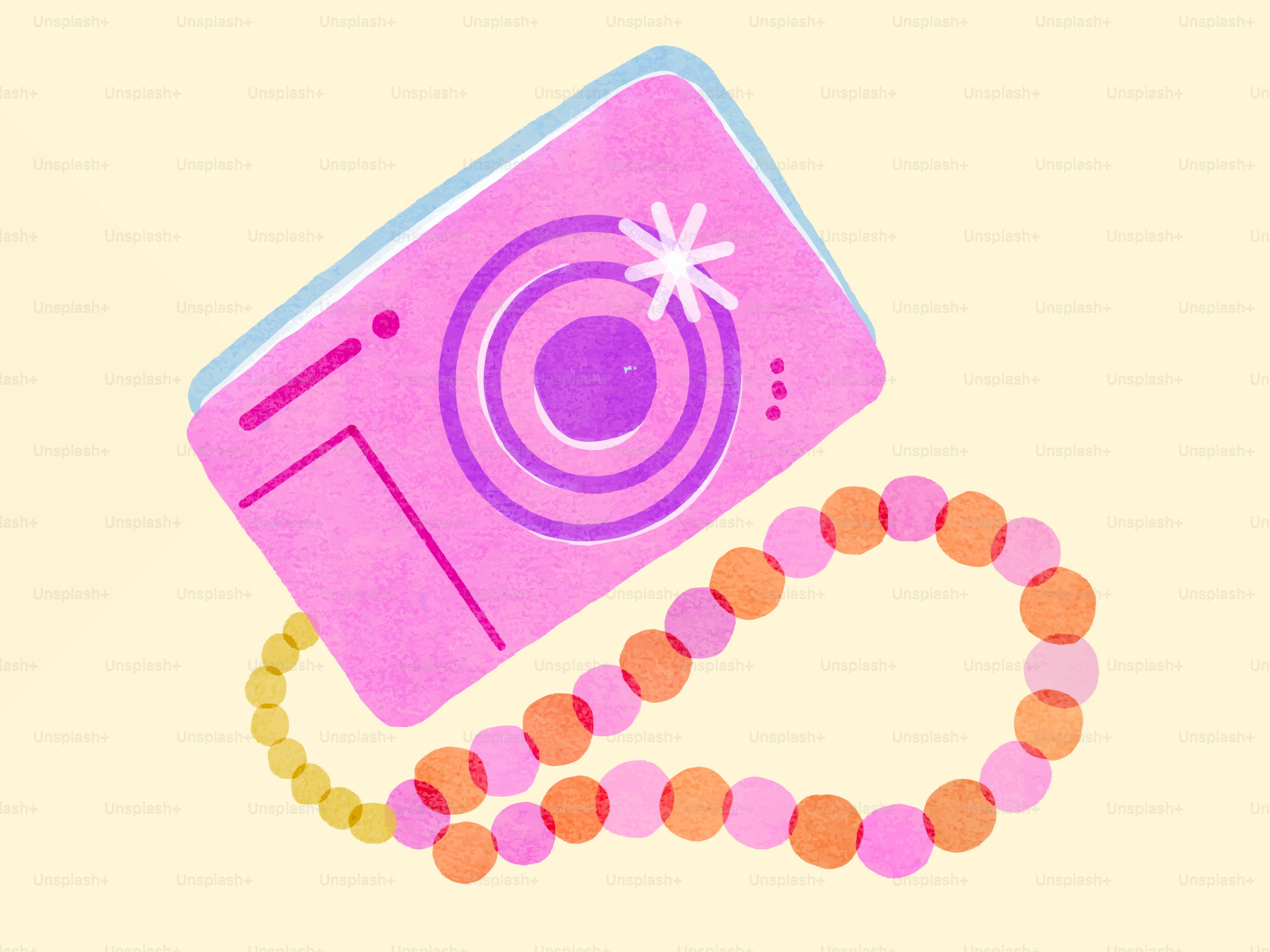 A pink digital camera with a beaded strap