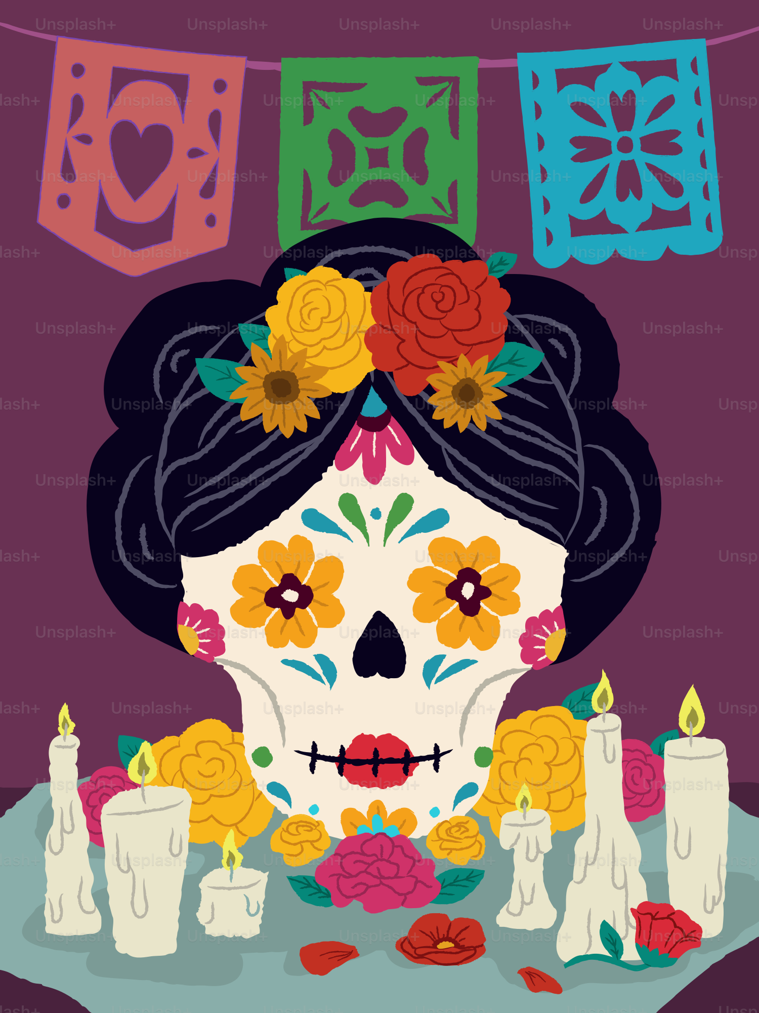 Sugar skull decorated with flowers and surrounded by candles.