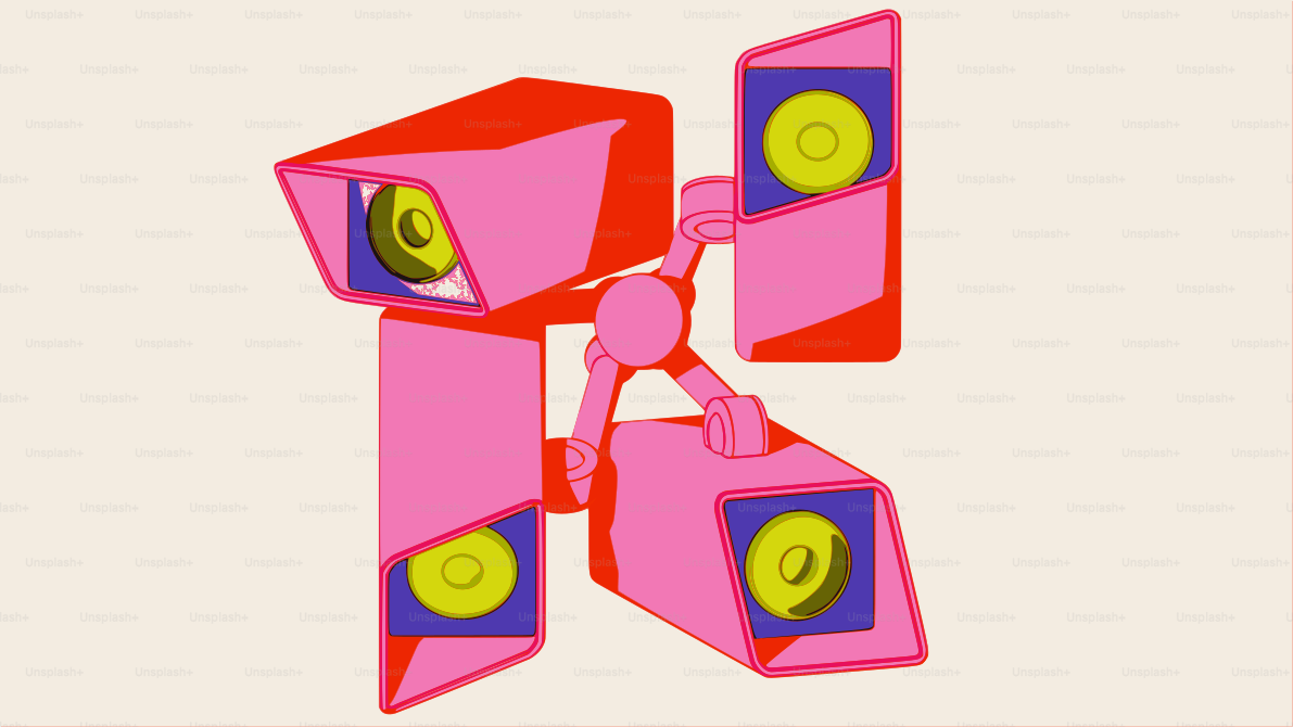 Three pink security cameras on a light background