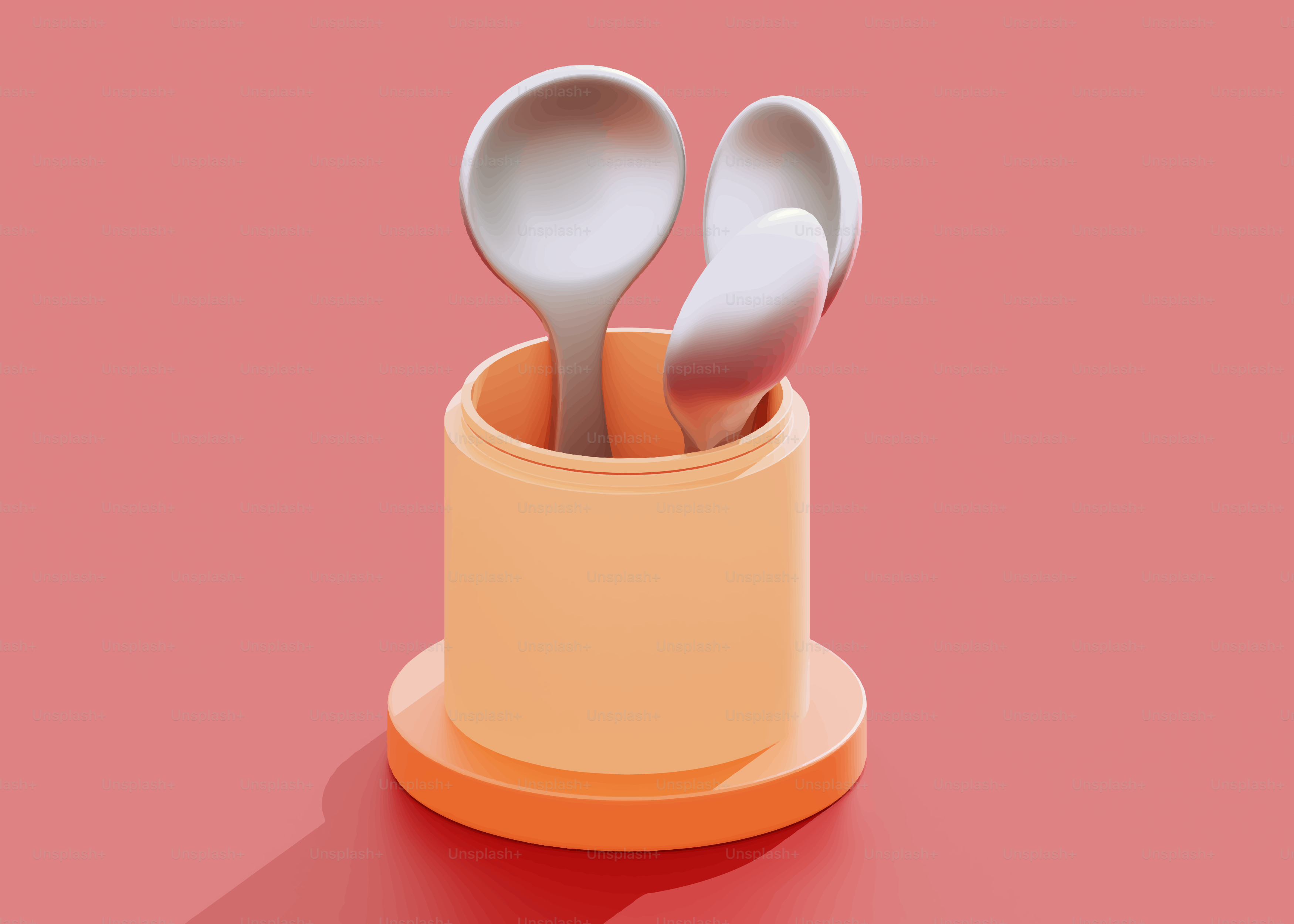 Three spoons in a holder on a pink background.