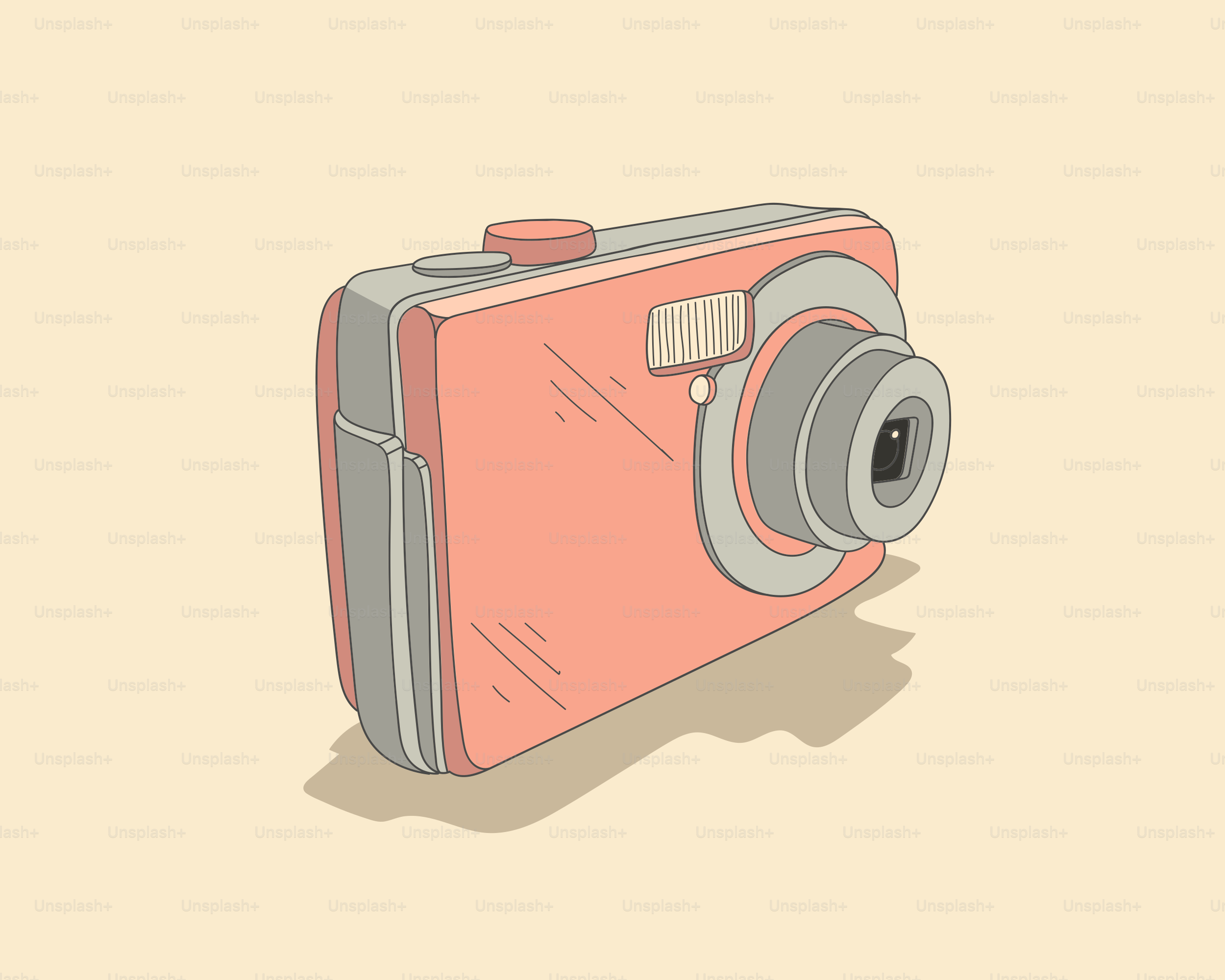 A coral-colored digital camera on a light background.