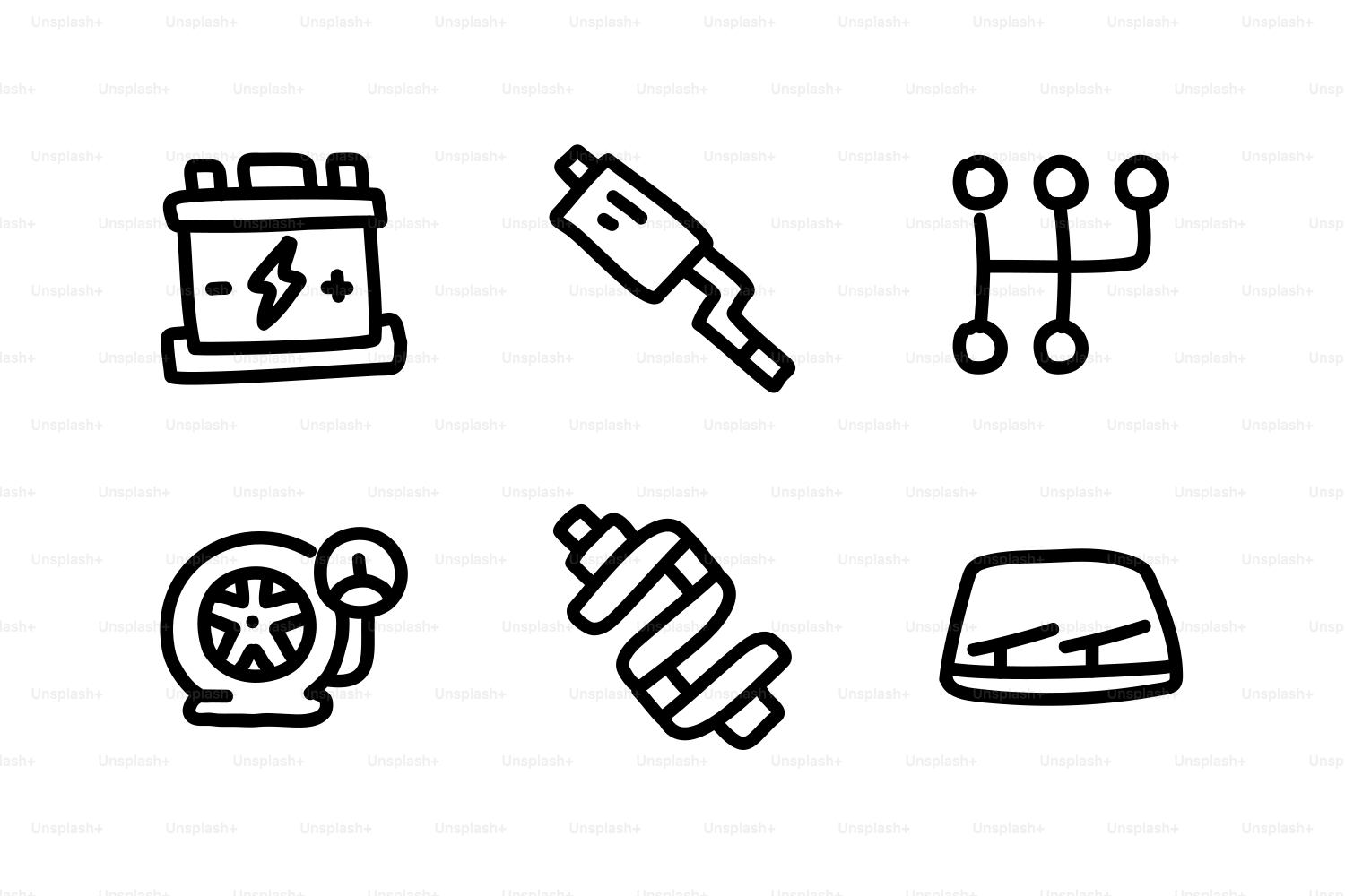 Autoteile wie Batterie, Auspuff und Schalthebel.