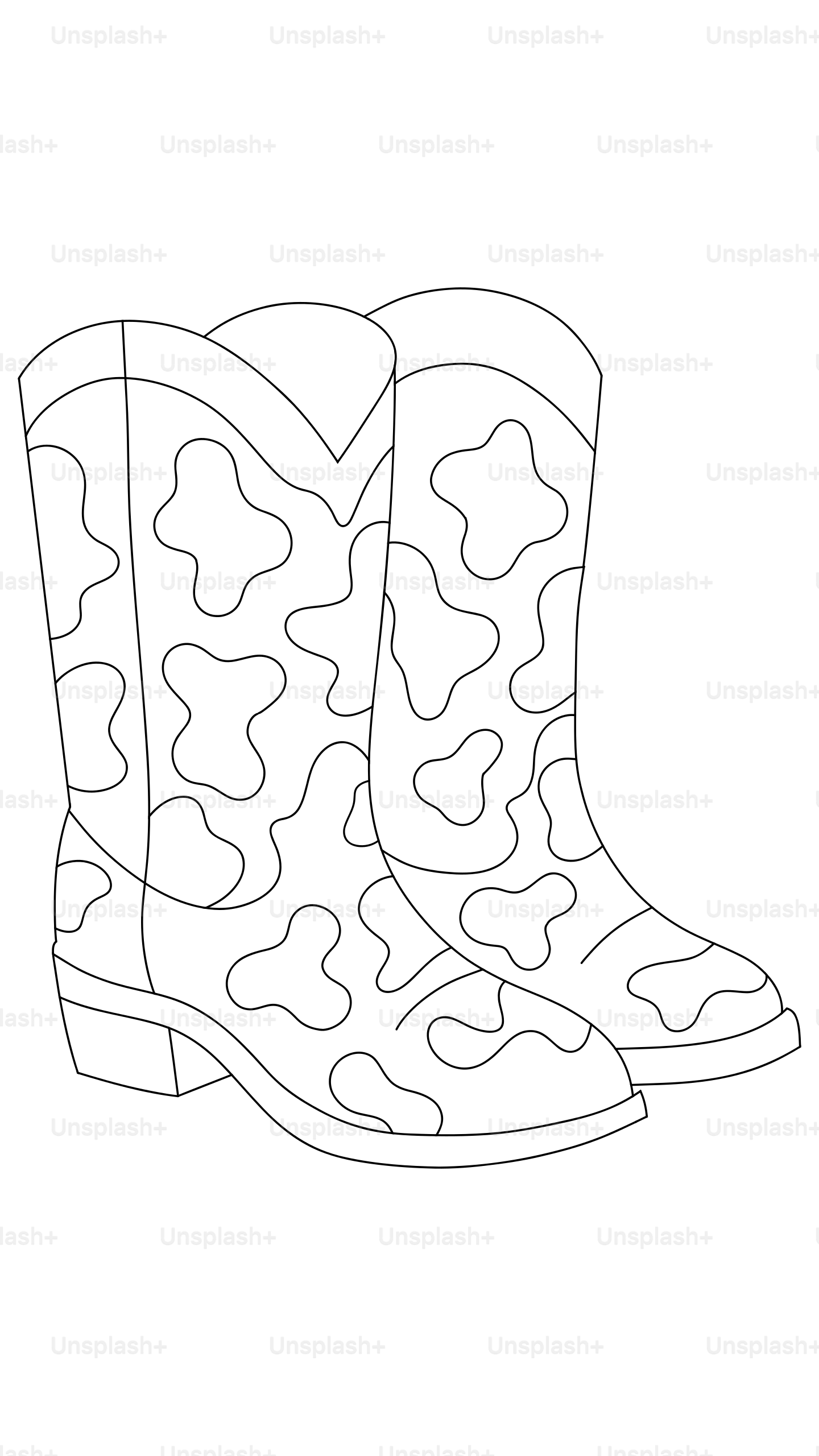 A pair of cowboy boots with a cow print pattern.