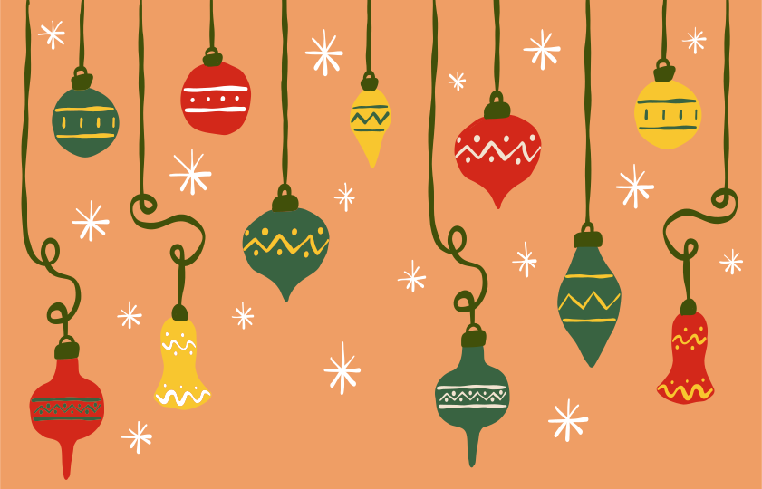 Colorful vintage christmas ornaments hang against orange background.