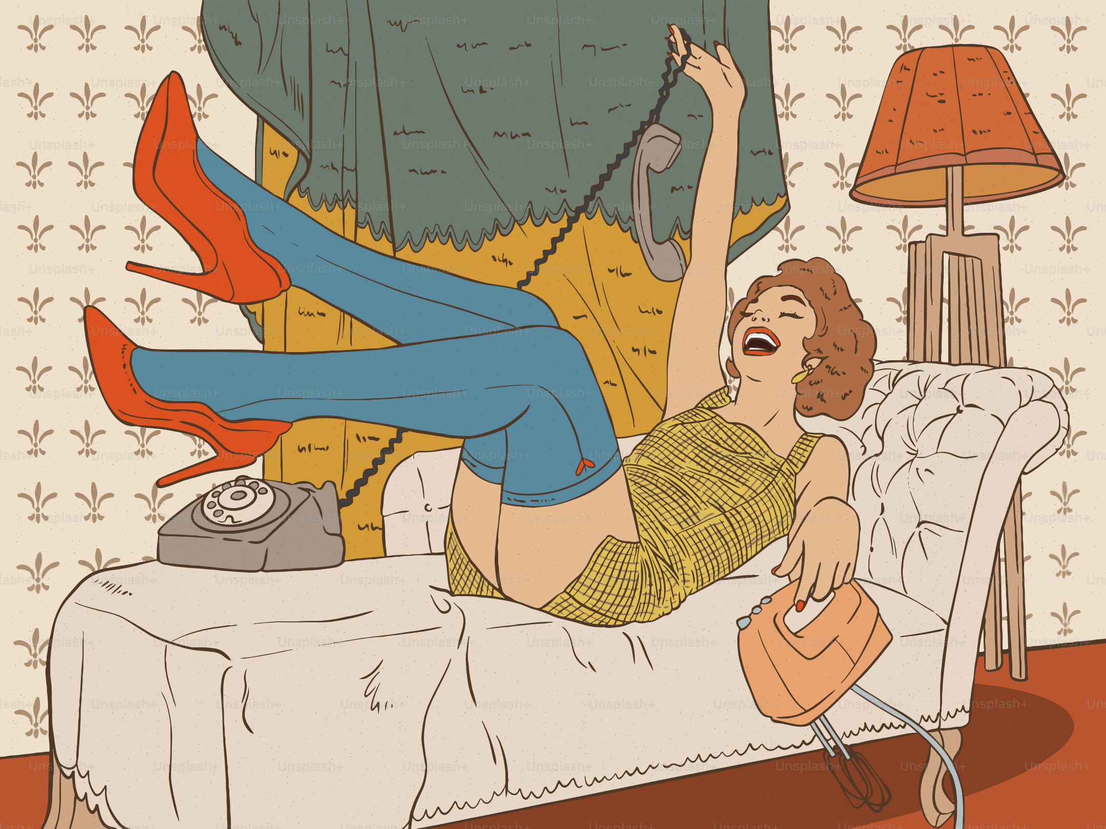 Woman laughing on the phone while lounging on a chaise.