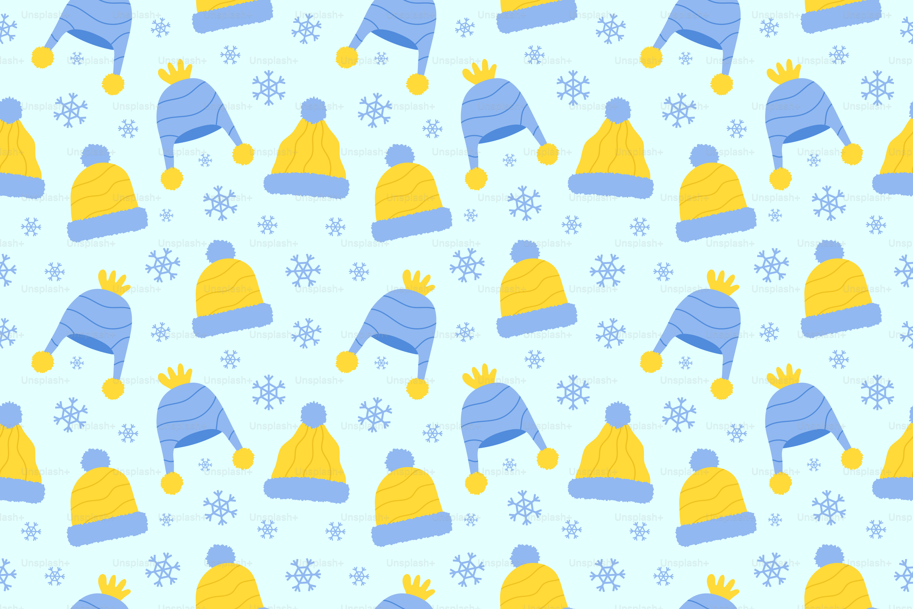 Blaue und gelbe Wintermützen mit Schneeflockenmuster