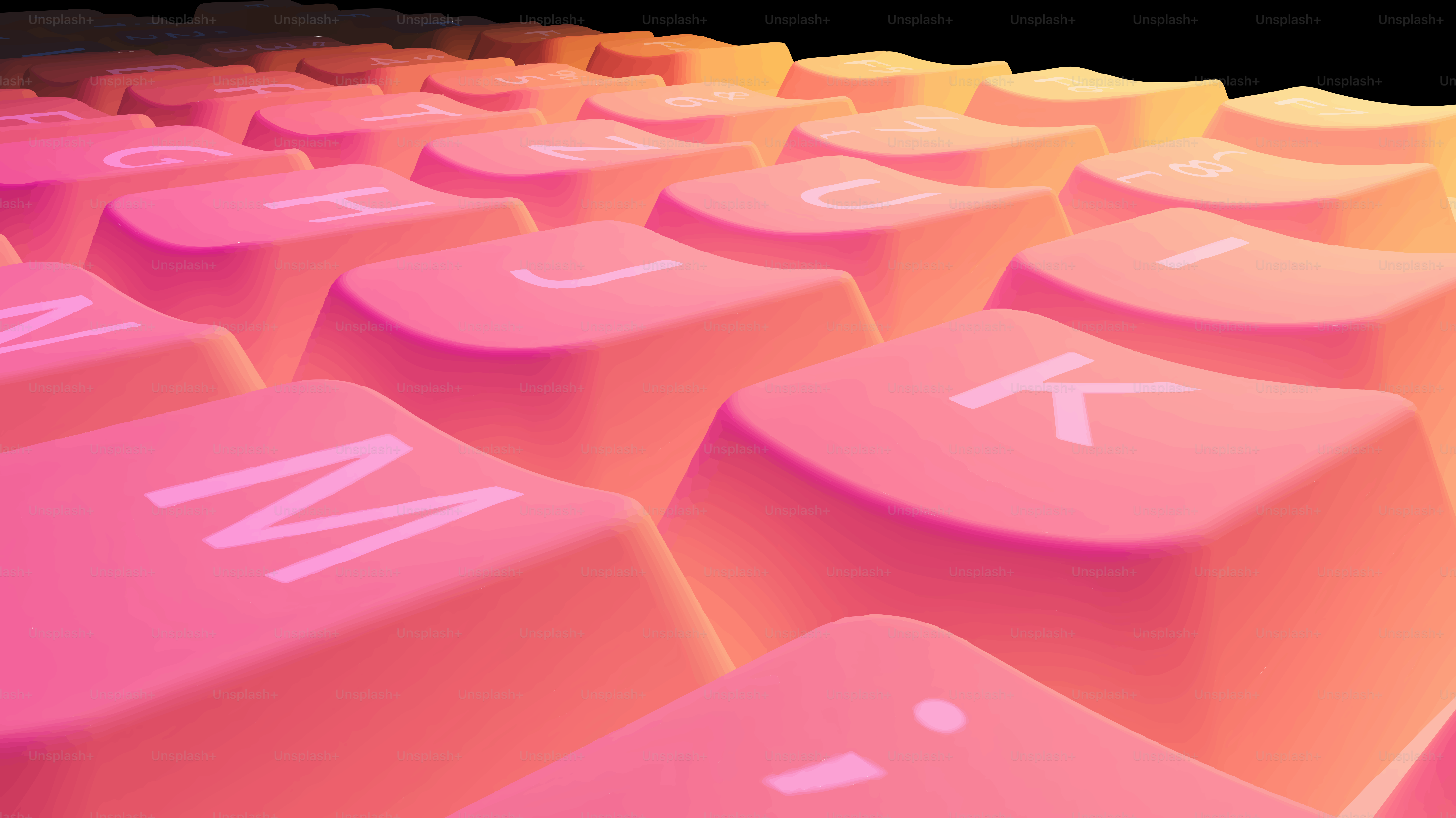 Primer plano de un teclado rosa y naranja