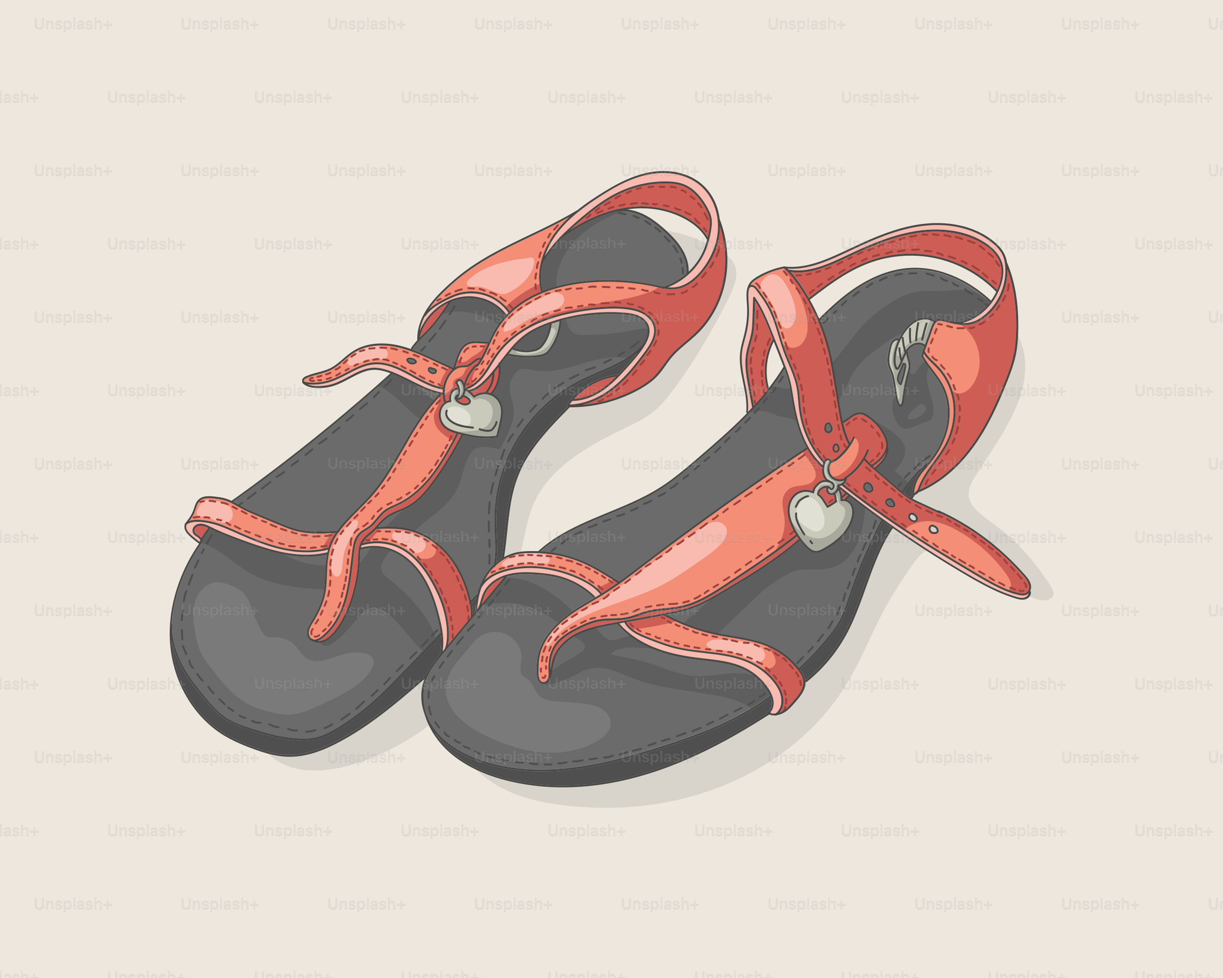 Ein Paar rote Sandalen mit Herzanhängern