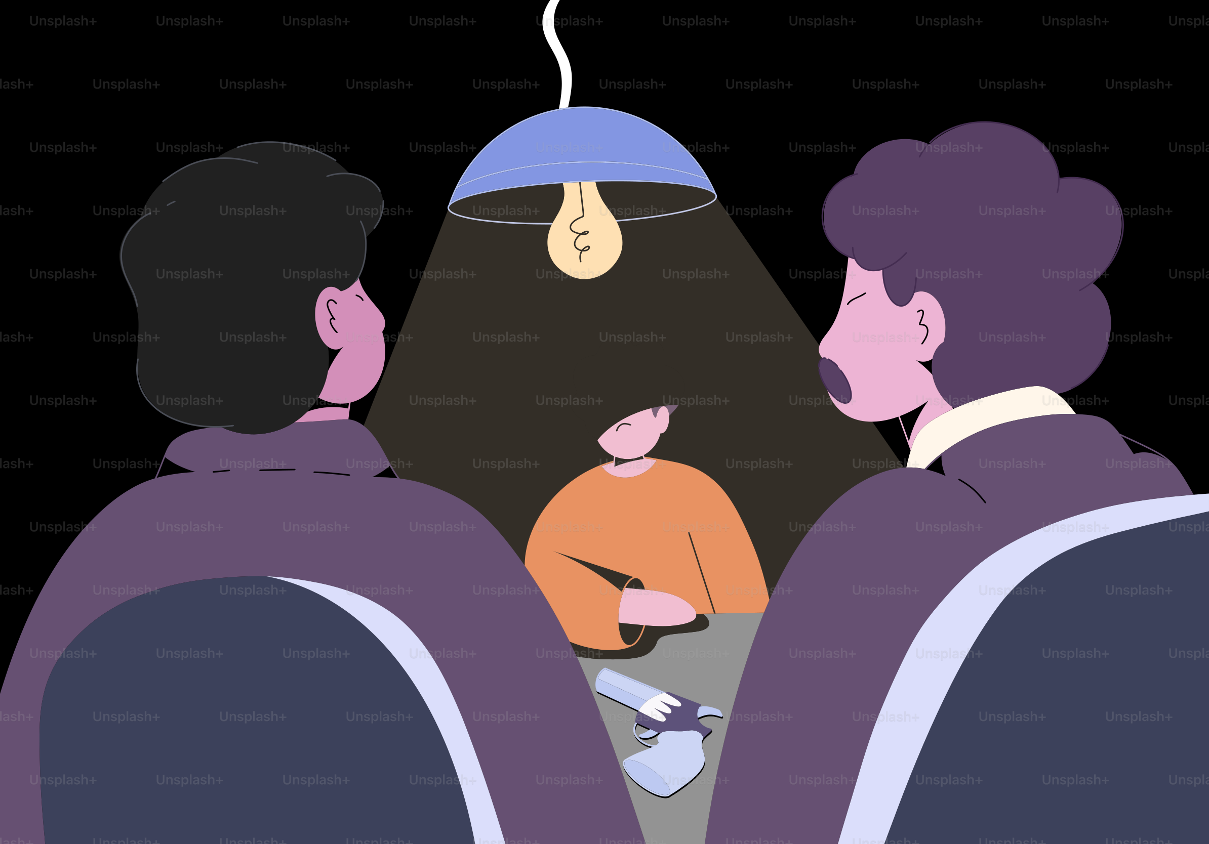 Three people gathered around a table under a lamp.