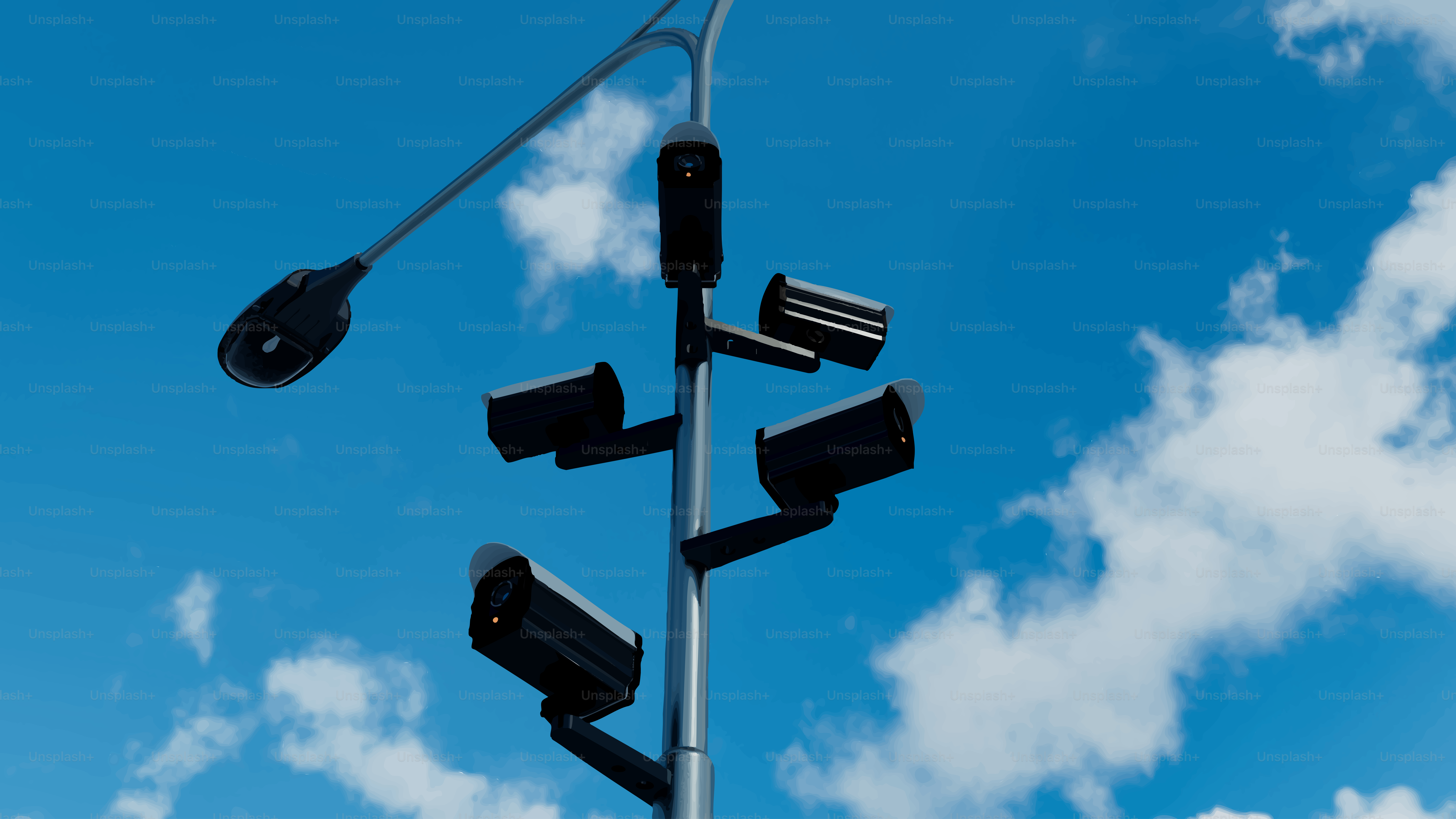 Streetlight with multiple security cameras against blue sky