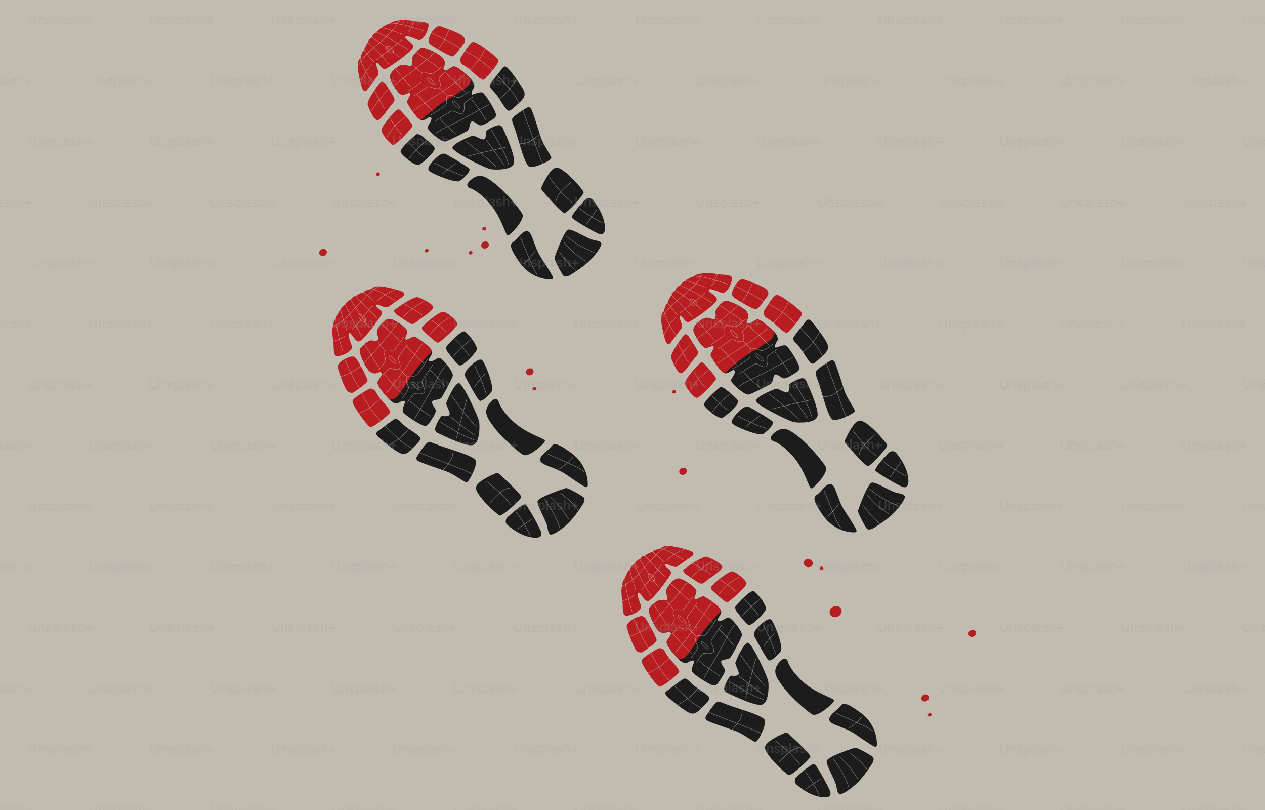 薄い背景に赤と黒の靴跡が4つ