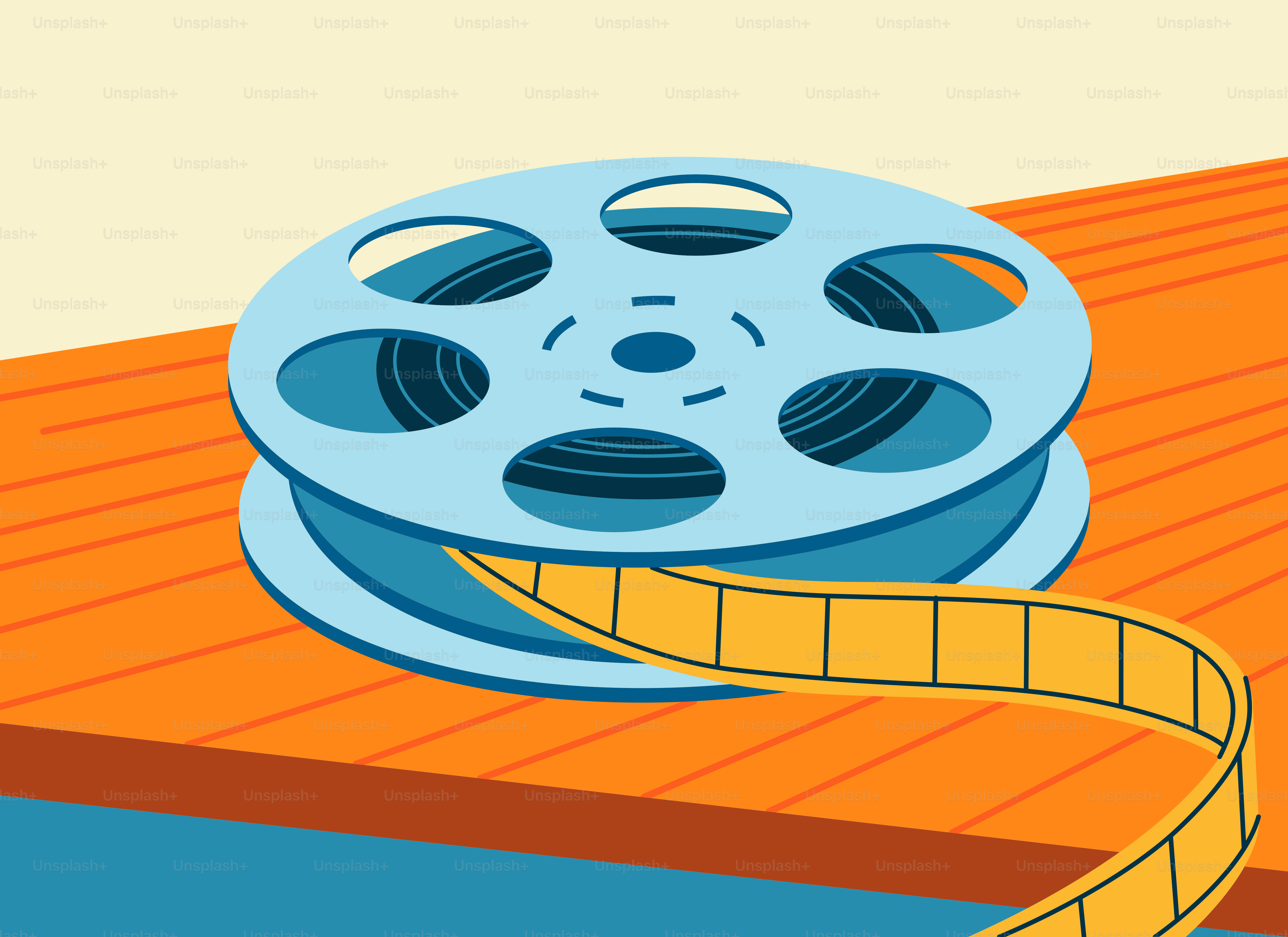 Un carrete de película con película amarilla desenrollándose