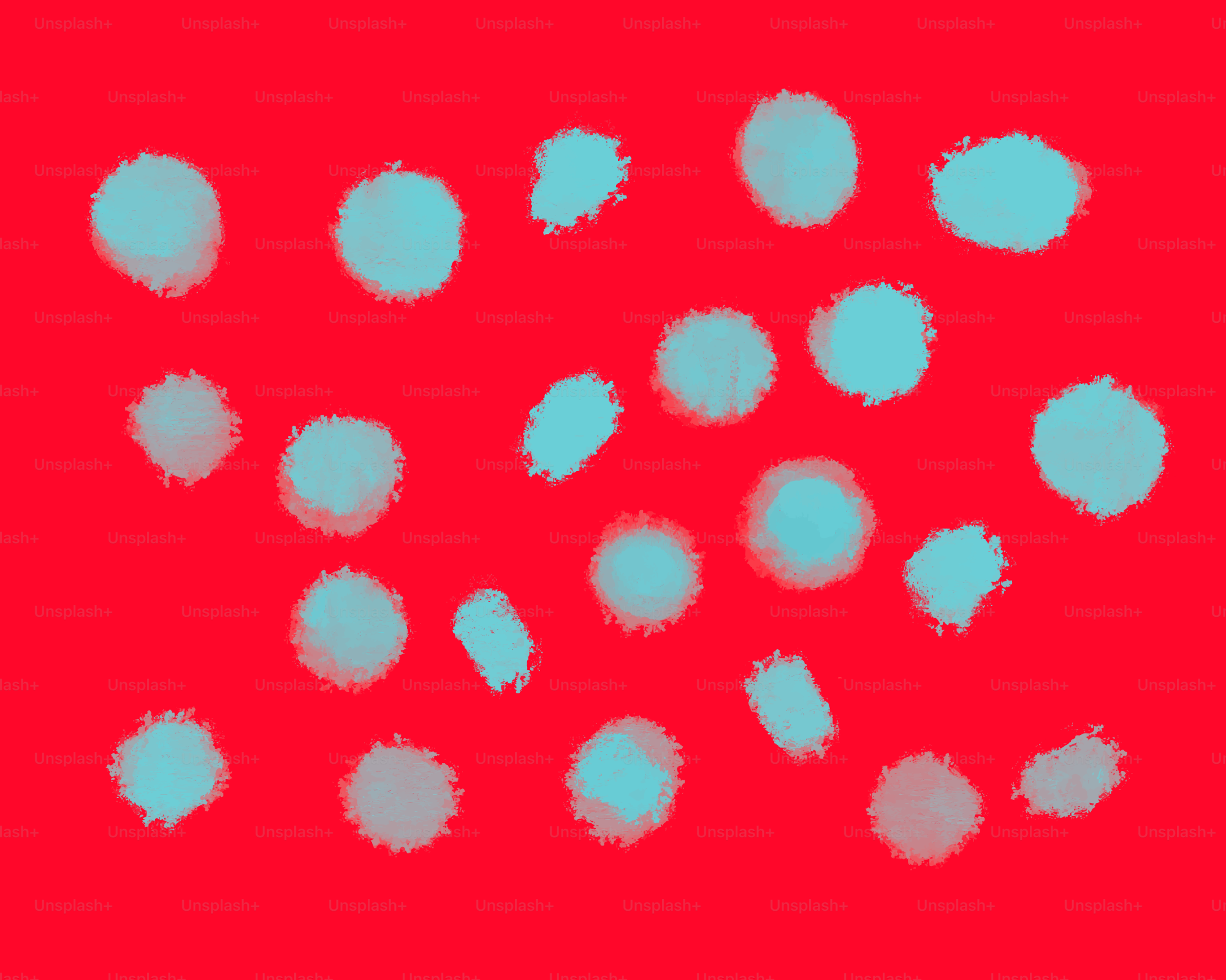 Teal polka dots on a red background