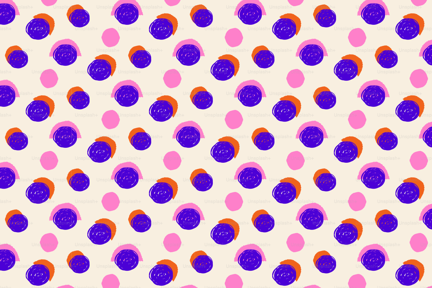 A cream background with a polka dot pattern