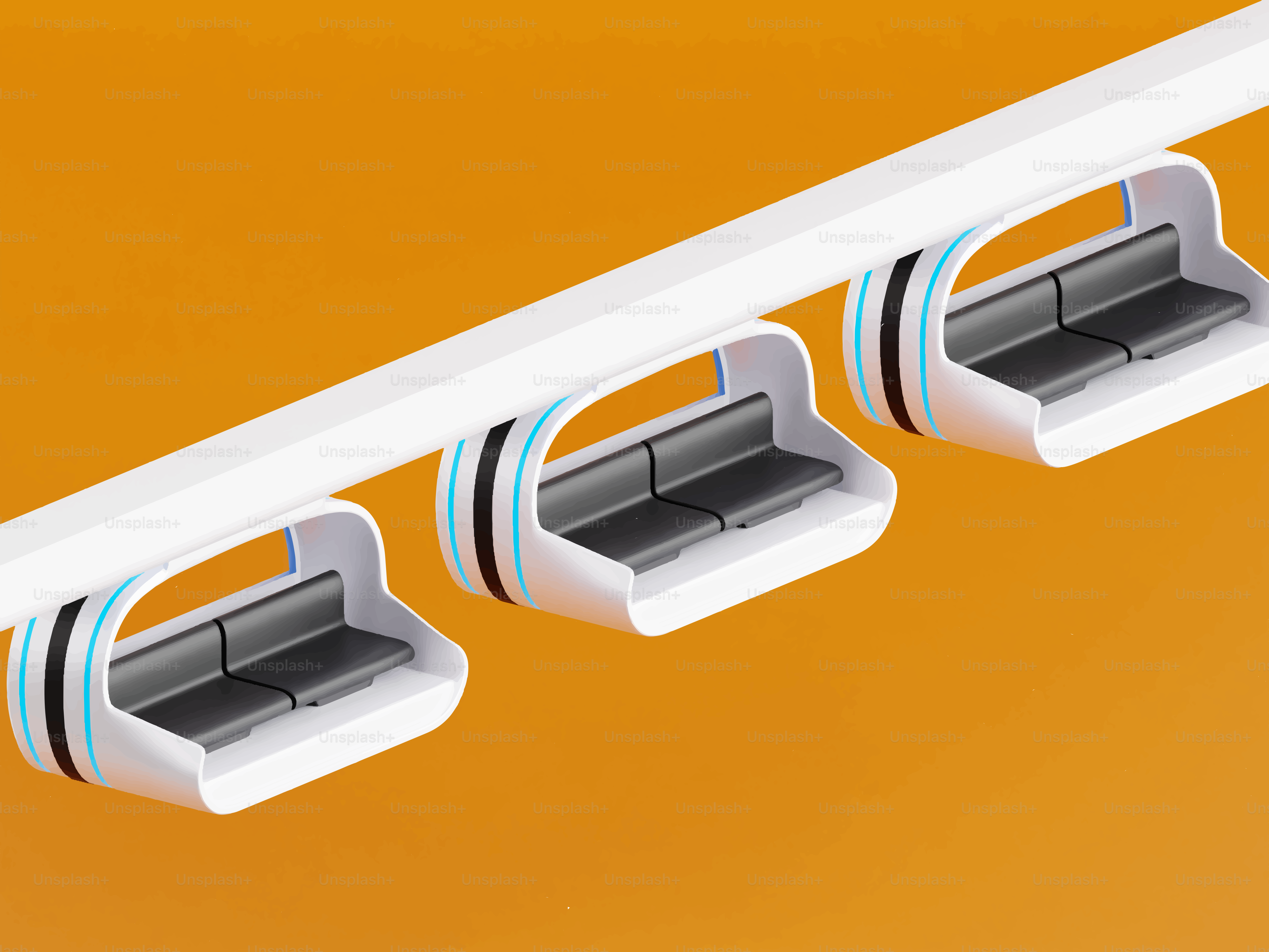 Three modern cable car cabins on a track.