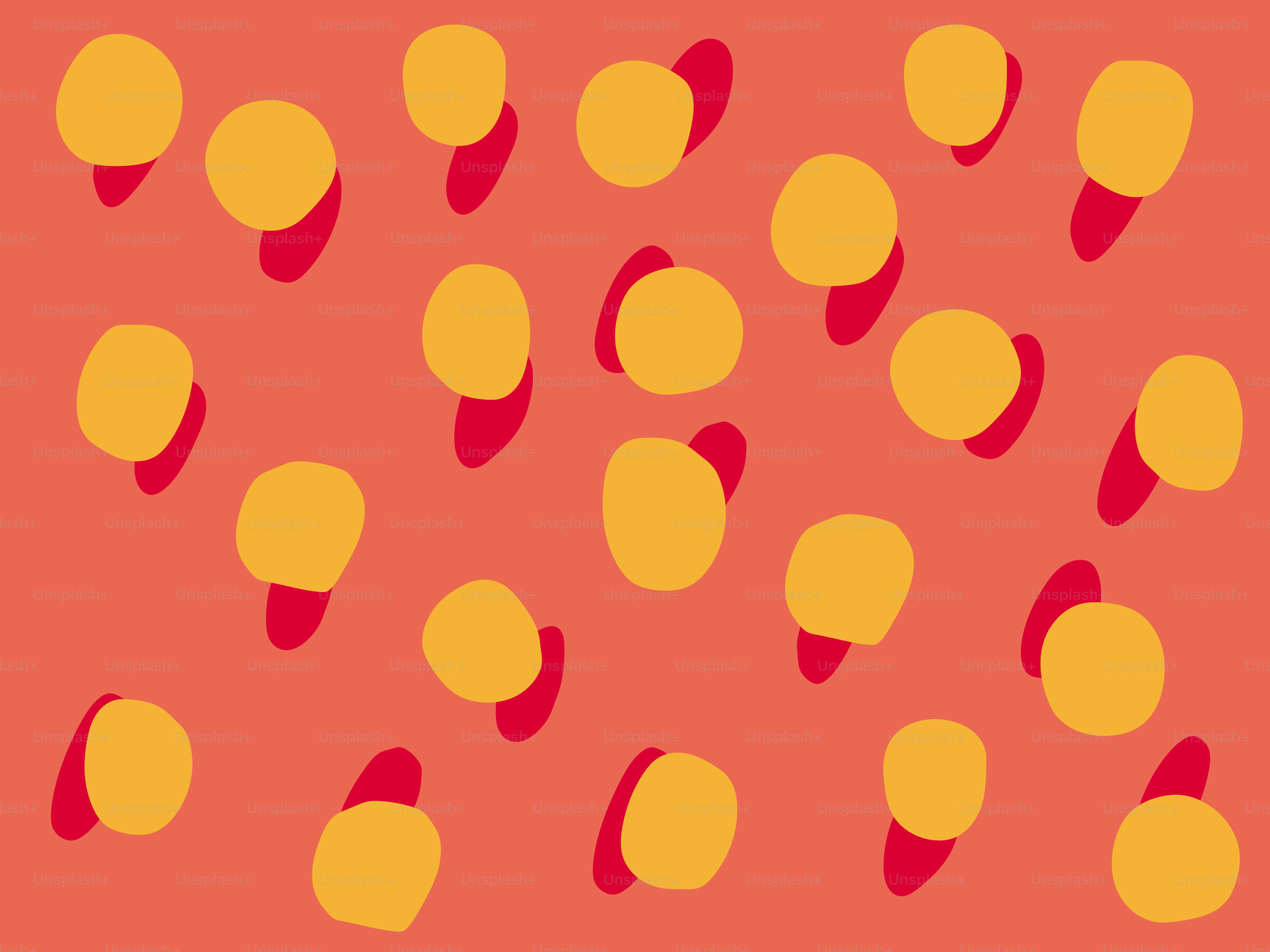 Yellow circles with red shadows on coral background.