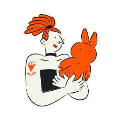 Person holding an orange bunny toy