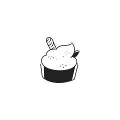 Um cupcake com cobertura e uma bengala doce.