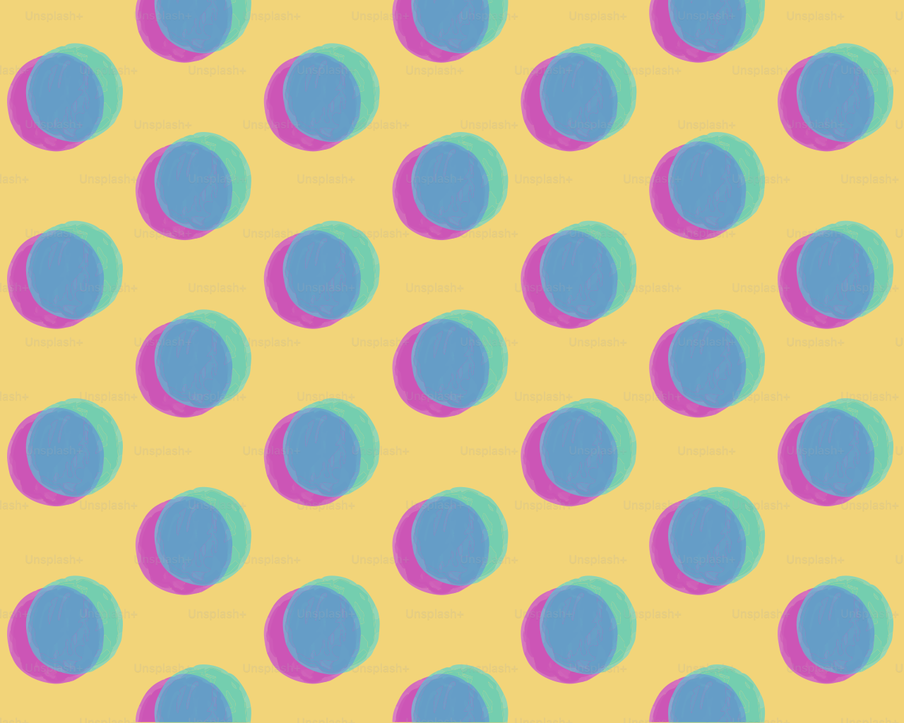 Yellow background with rows of blue and pink circles.