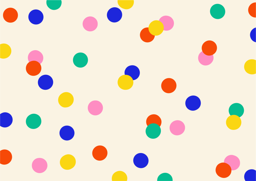クリーム色の背景にカラフルな水玉模様が散らばっている