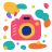 A pink camera surrounded by colorful abstract shapes