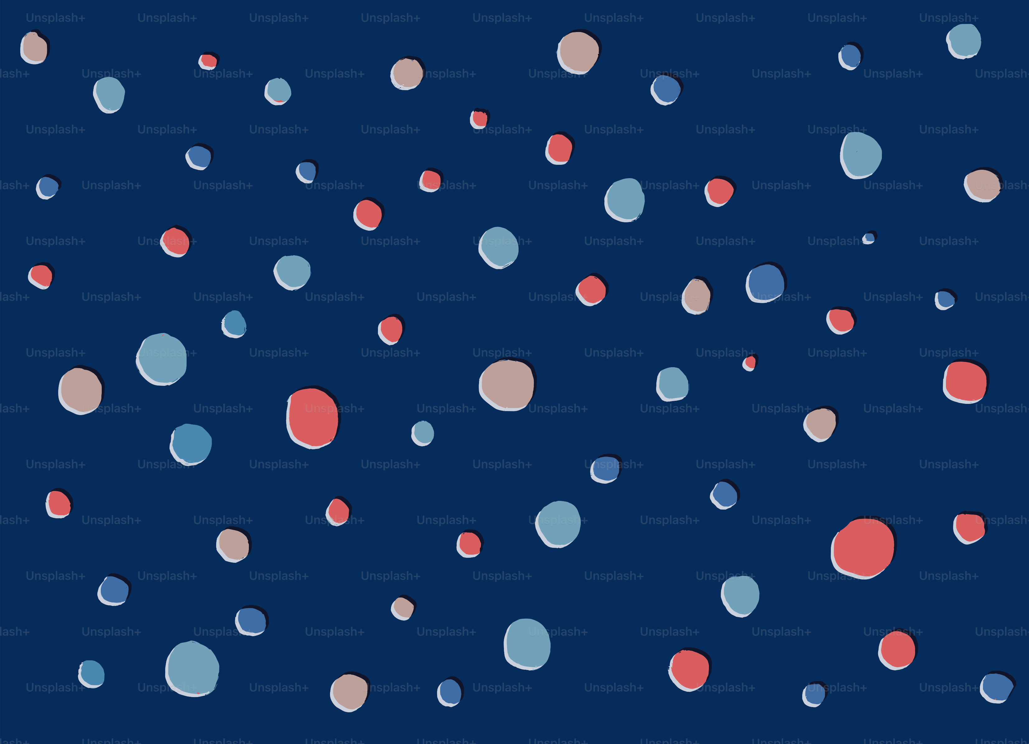 Scattered colorful dots on a dark blue background