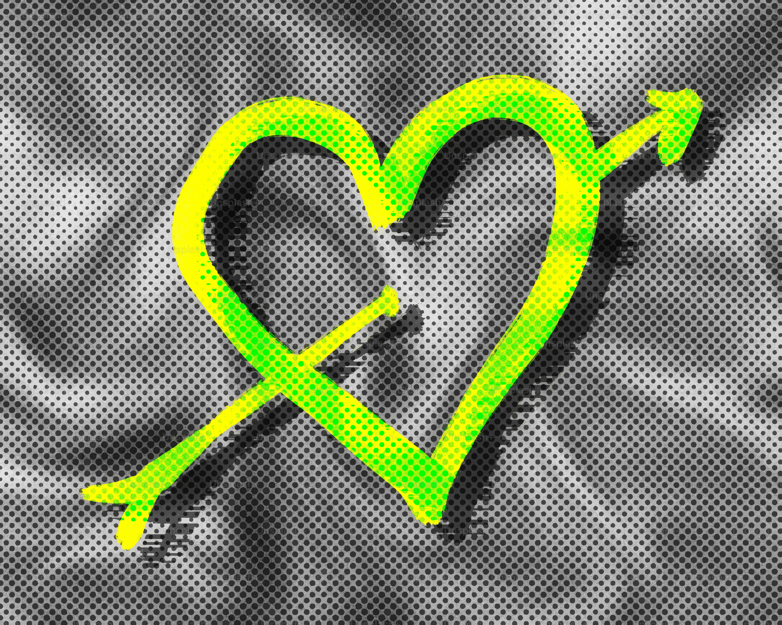 Green heart with arrow through it