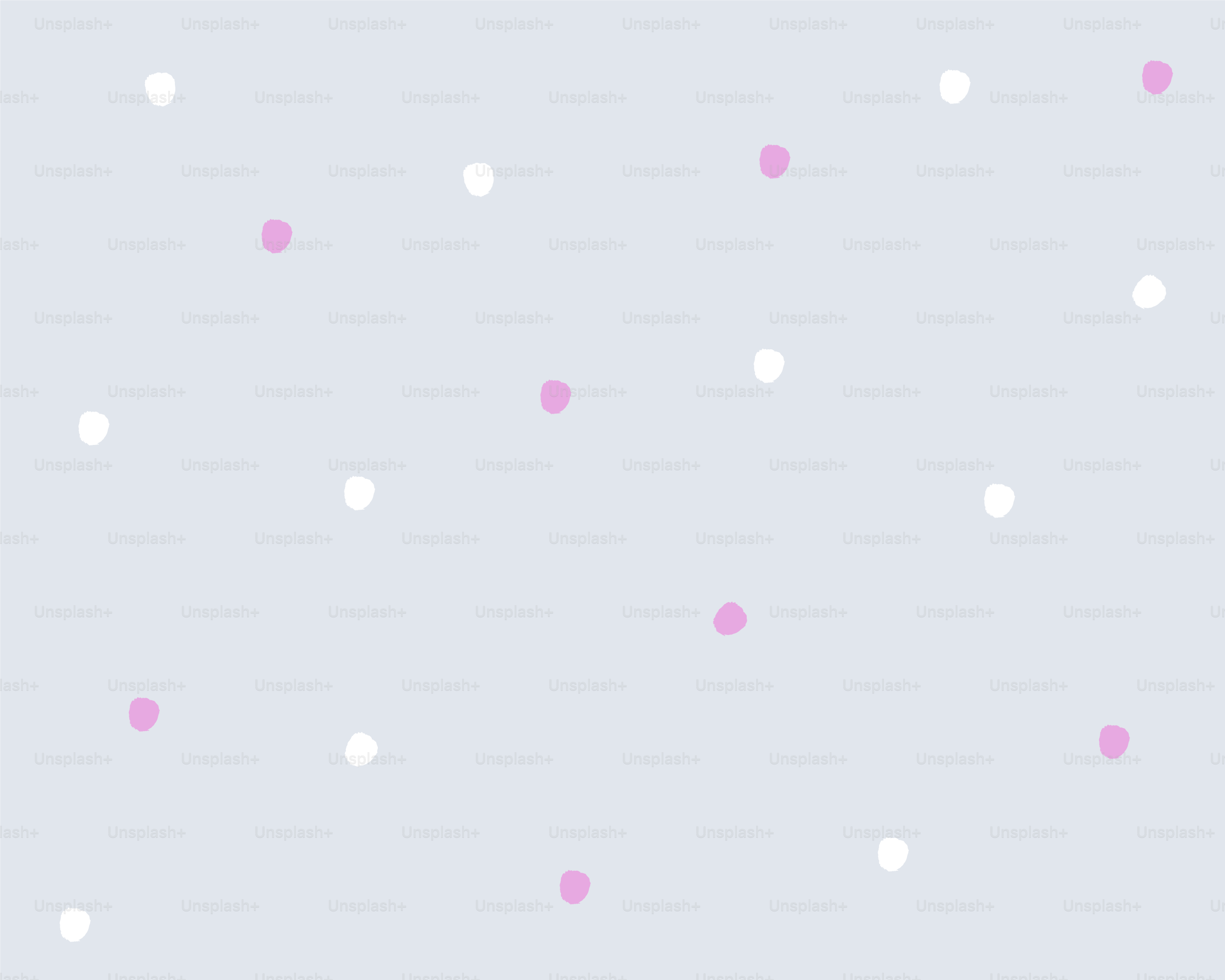 Scattered white and pink dots on a gray background
