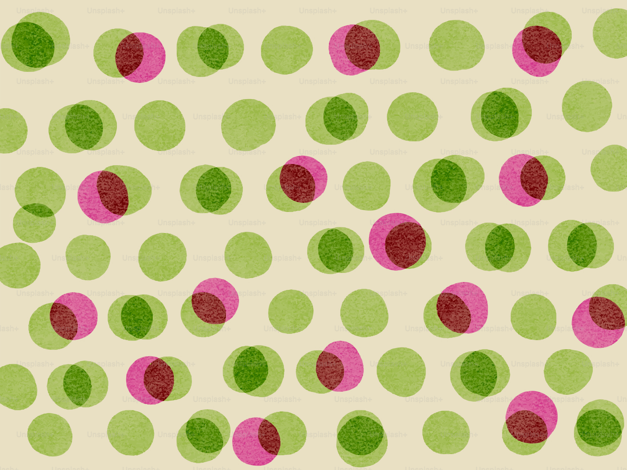 Overlapping green and pink dots on a cream background