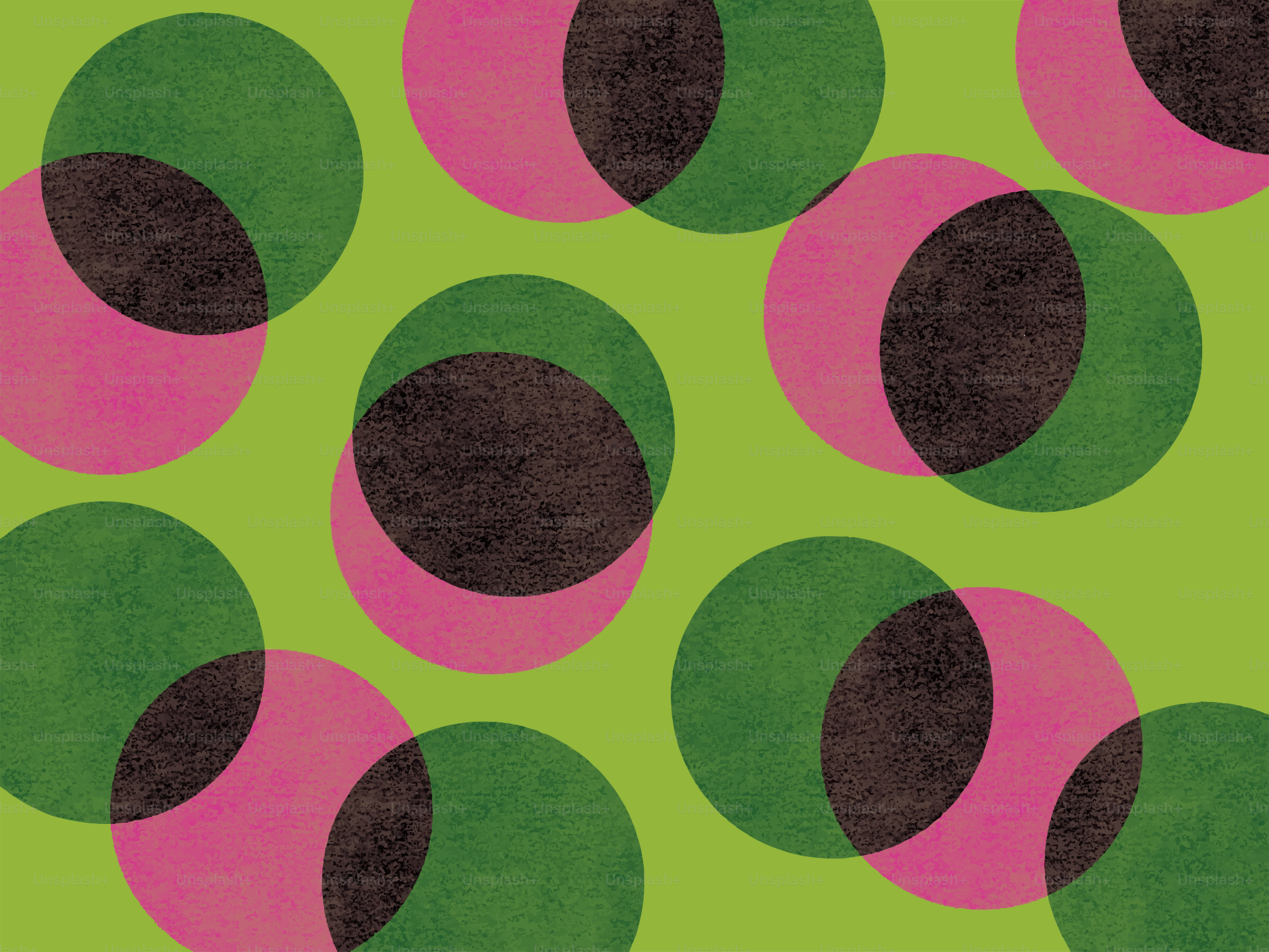 Overlapping pink and green circles on a lime green background