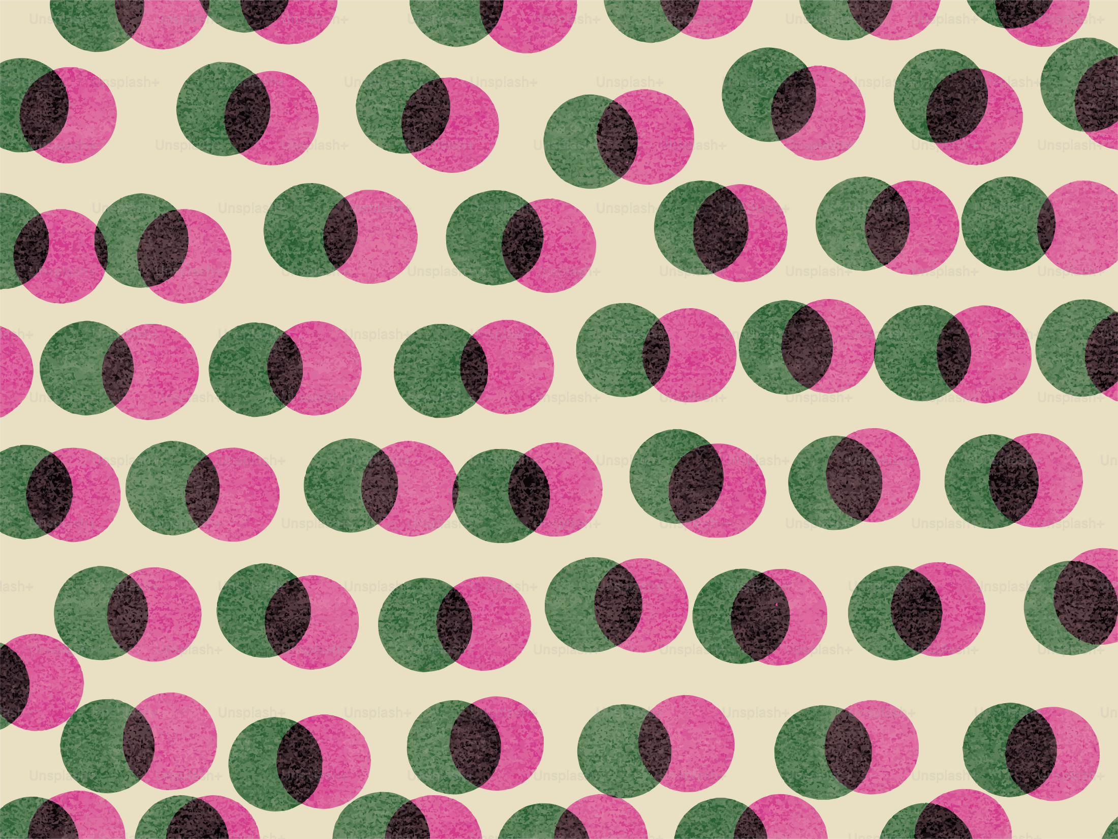Pattern of overlapping pink and green circles on cream background.