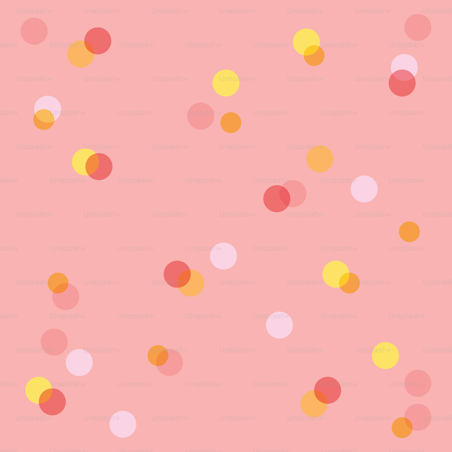 Scattered colorful circles on a pink background