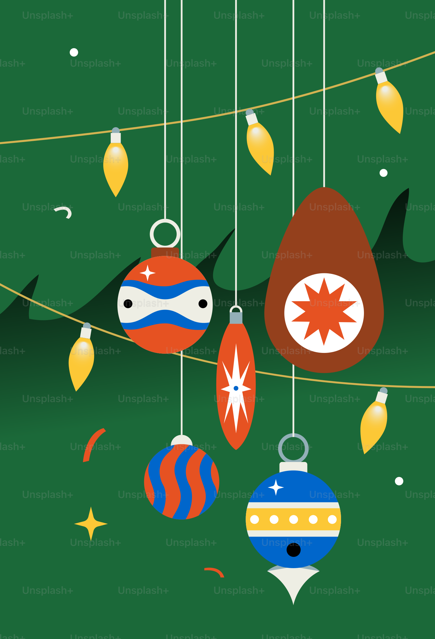 Colorful christmas ornaments hang on a green background.