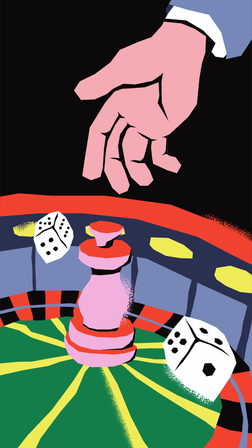 Hand over roulette wheel with dice and chips