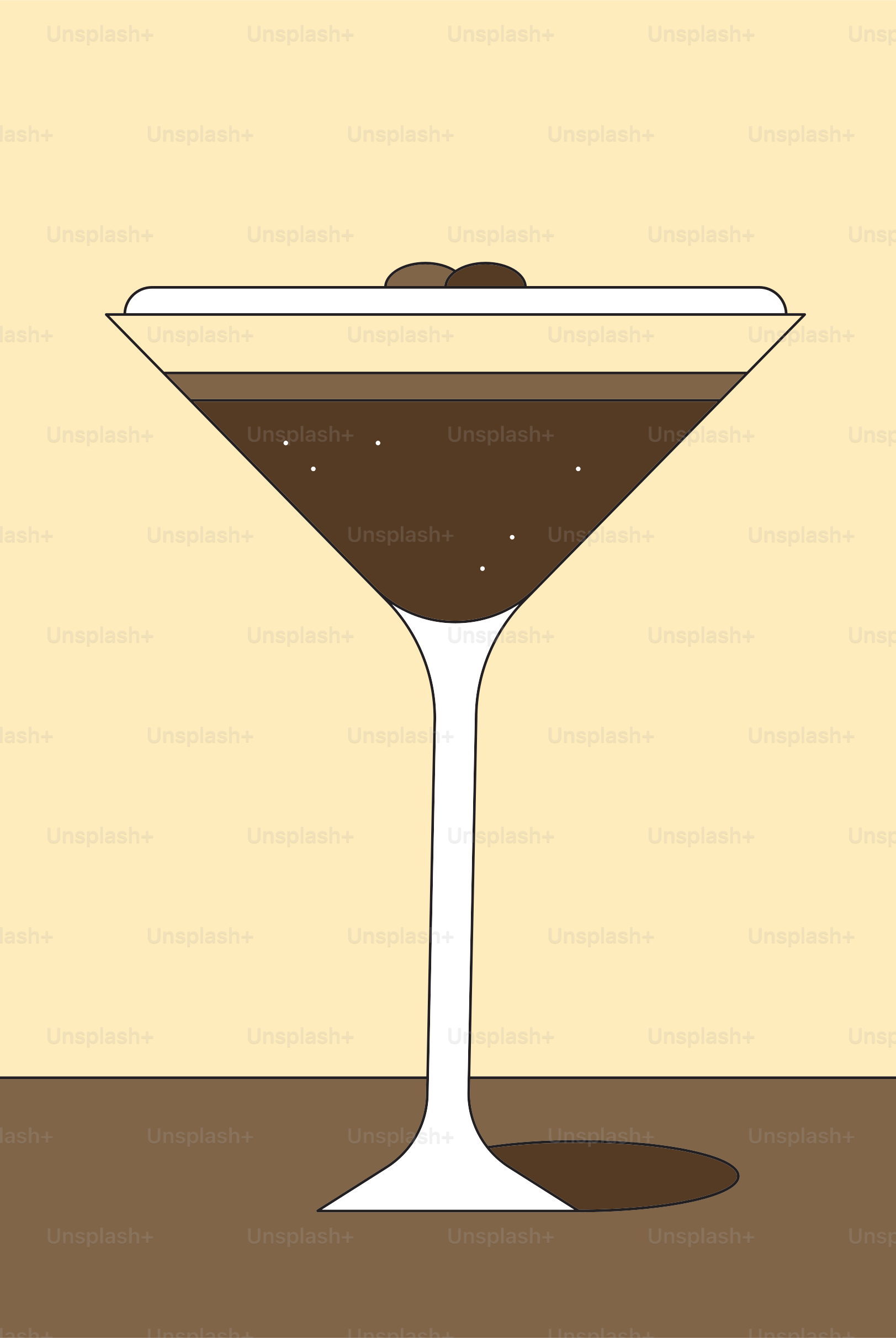 Martini glass filled with dark liquid and coffee beans