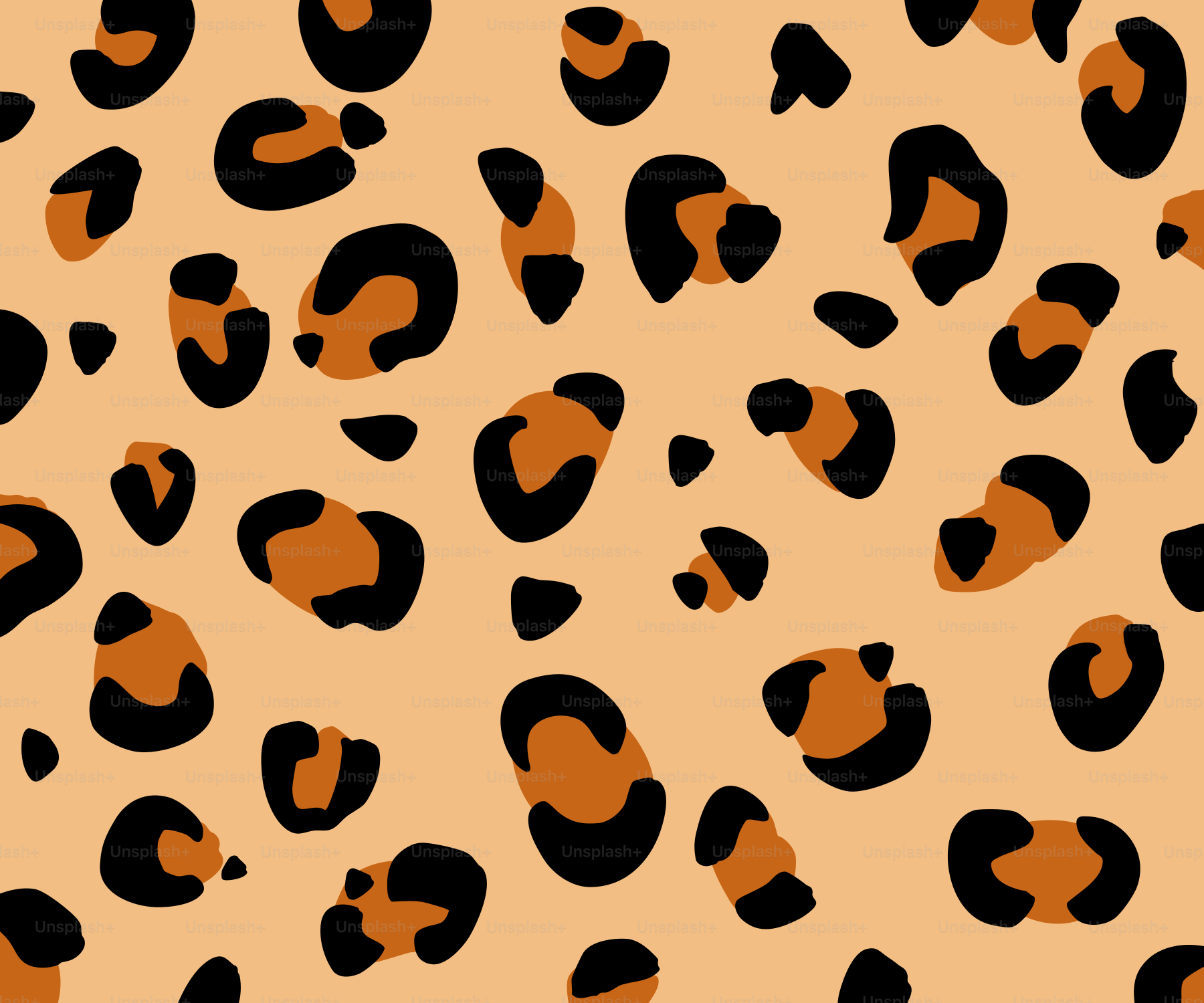 A repeating pattern of leopard spots on a tan background.