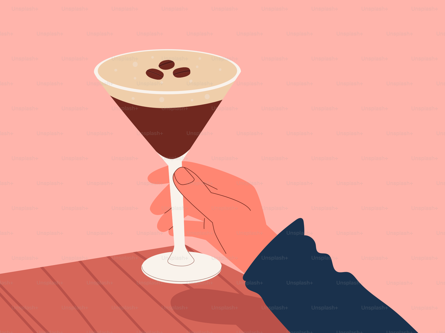 Hand holding martini glass with coffee drink